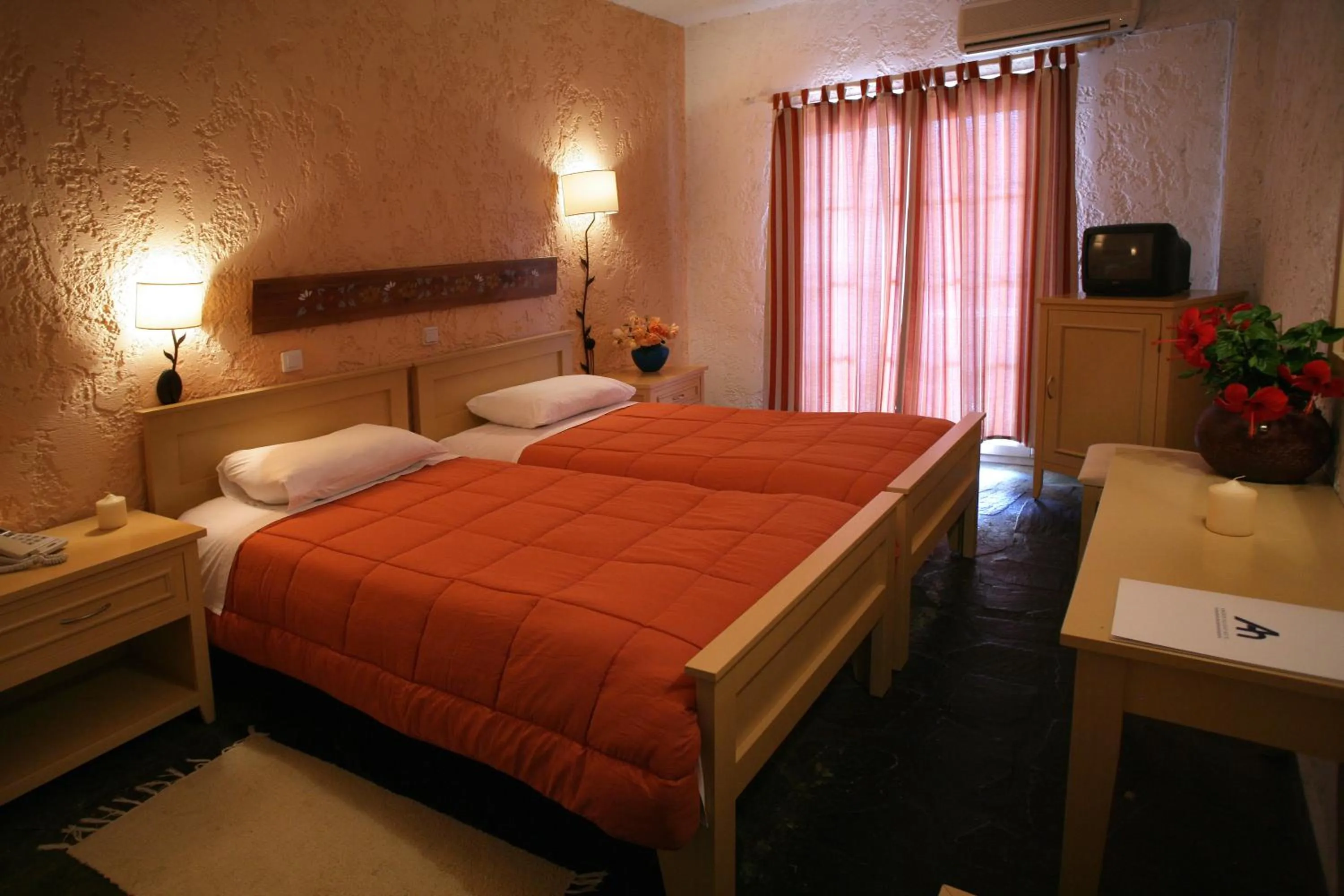 Bed in Andros Holiday Hotel