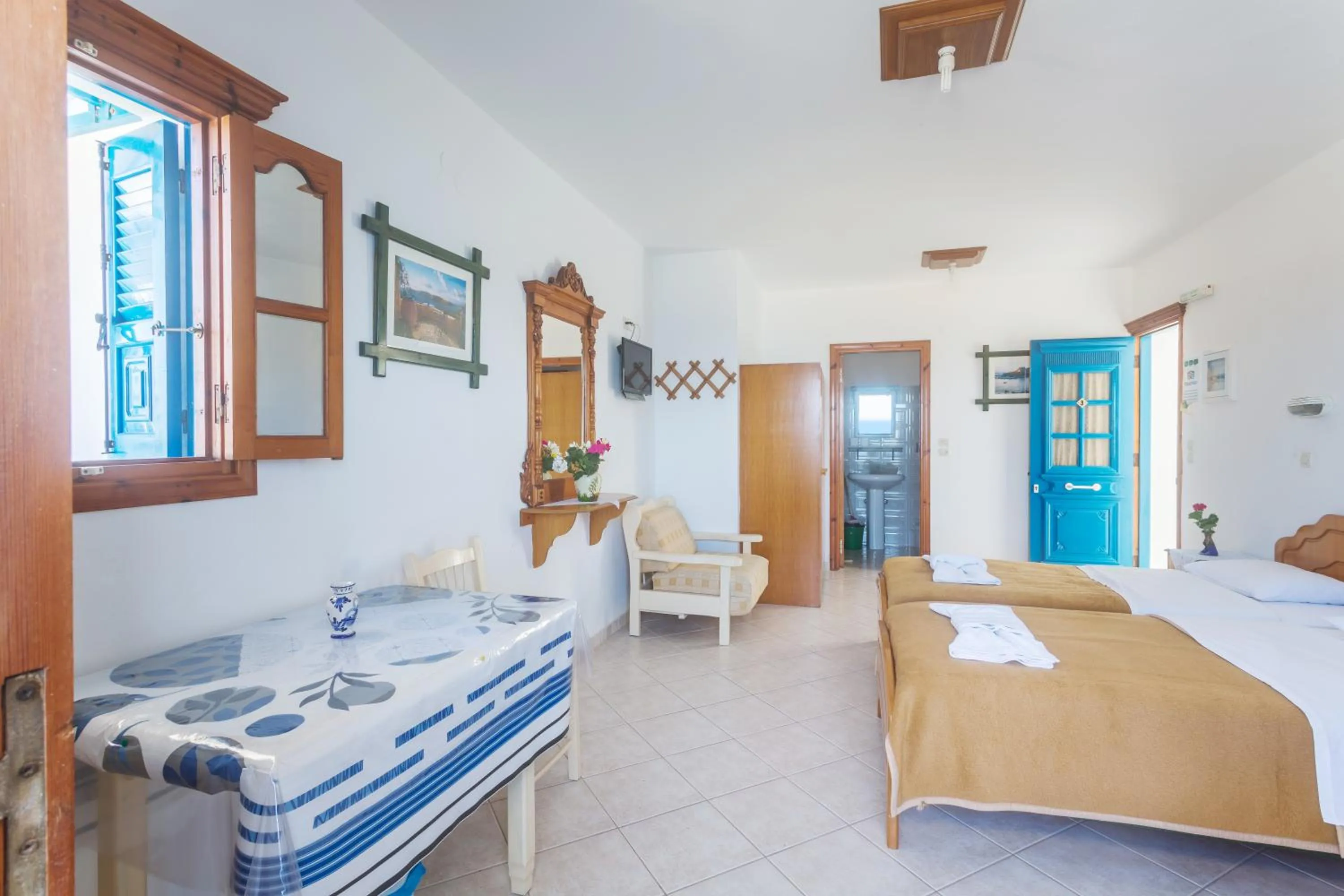 Seating area, Bed in Arhontiko Hotel