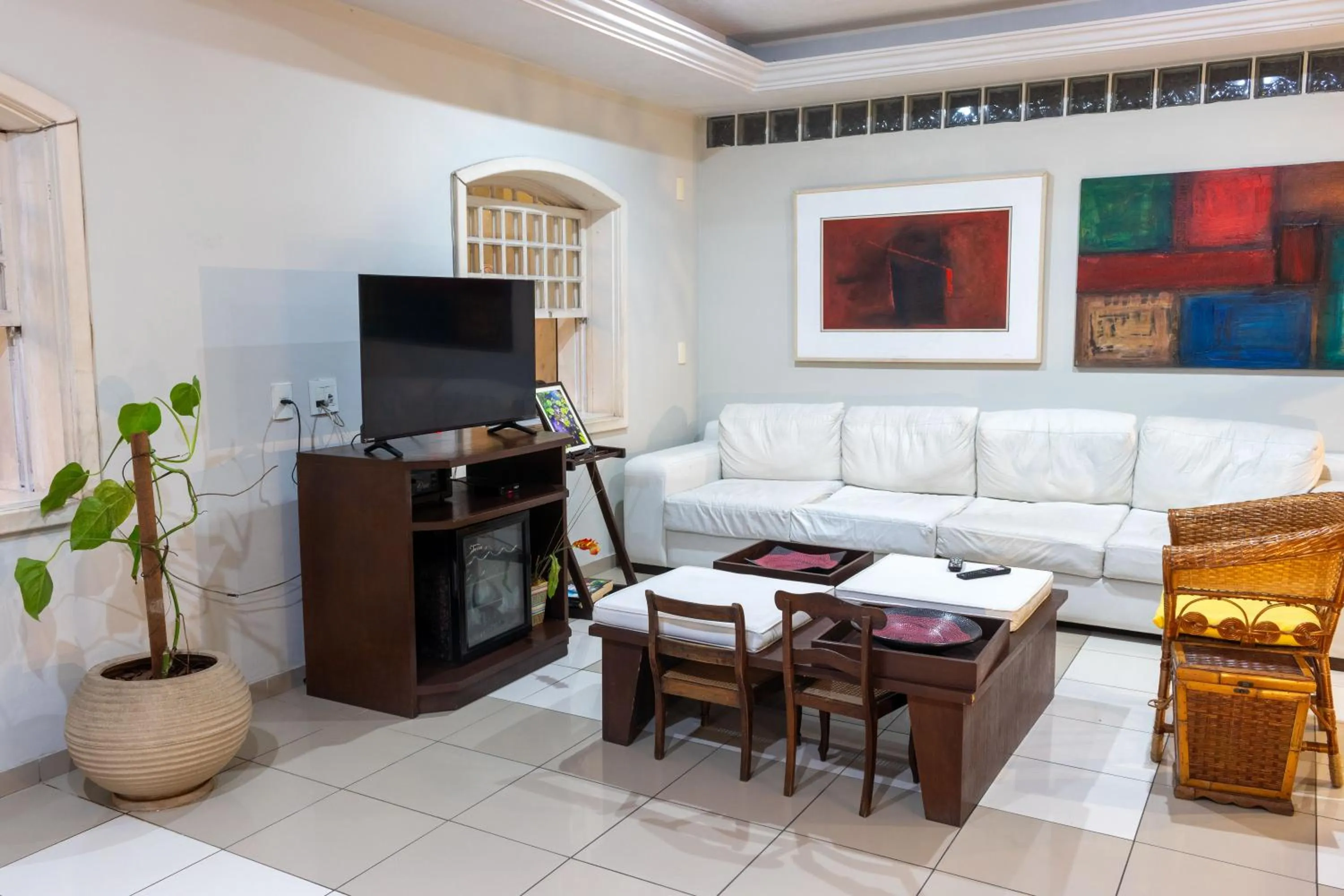 Communal lounge/ TV room in Pousada Boulevard
