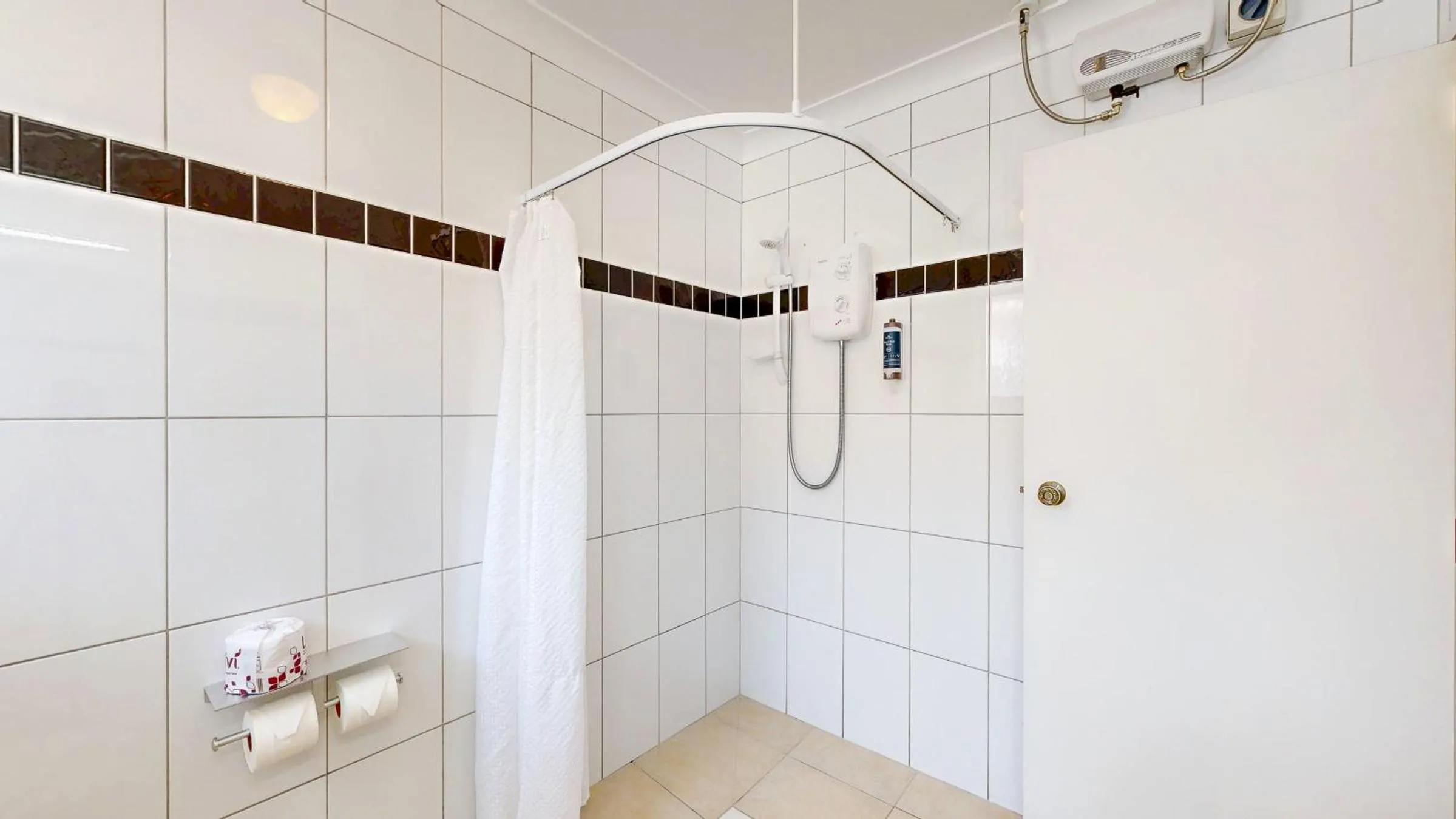 Shower in Albatross Motel