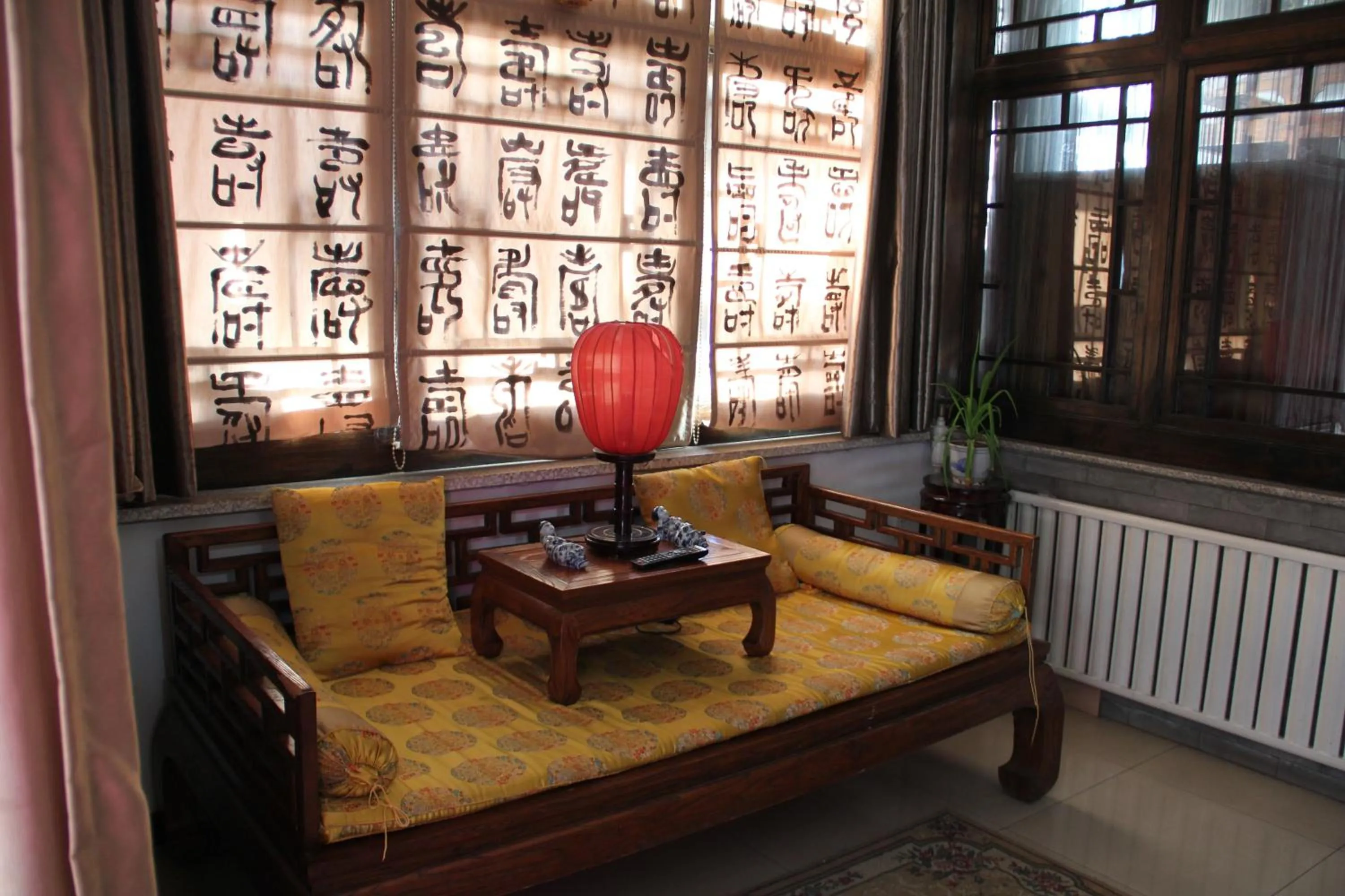 Seating area in The Great Wall Courtyard Hostel