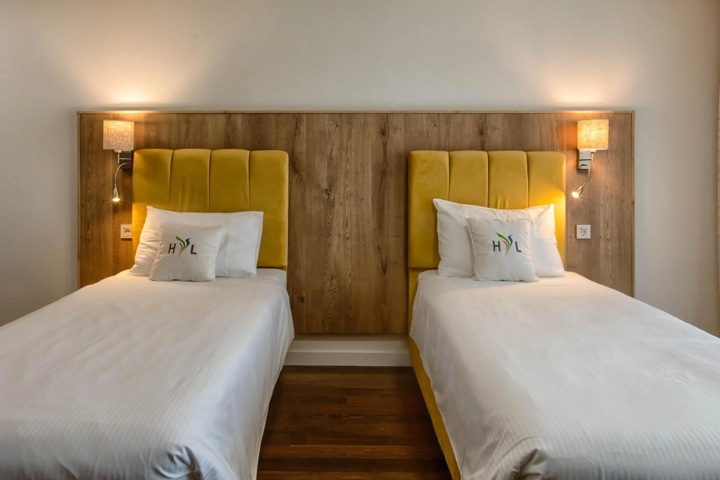 Bed in Hotel Residence Loren - contact & contactless check-in