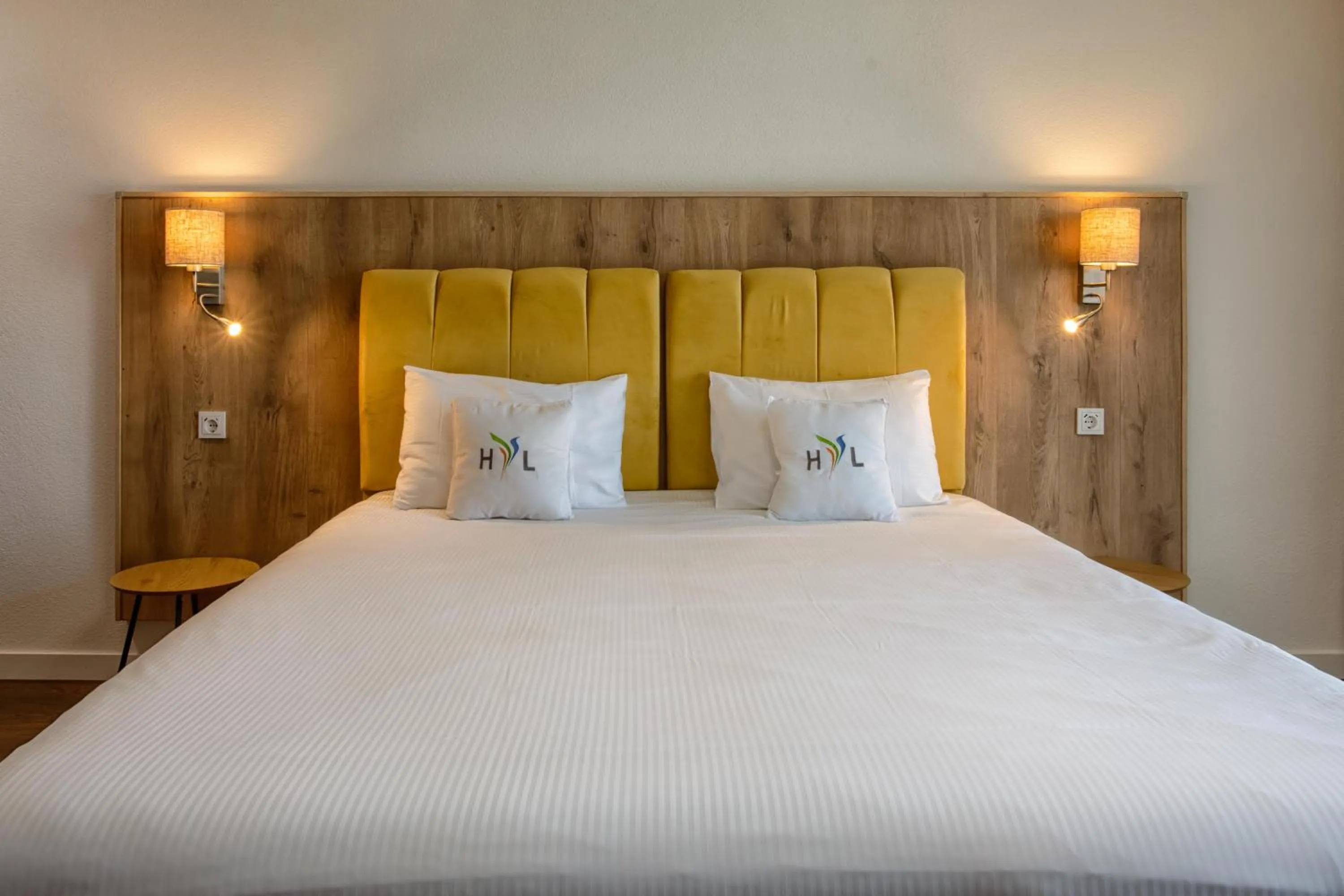 Bed in Hotel Residence Loren - contact & contactless check-in