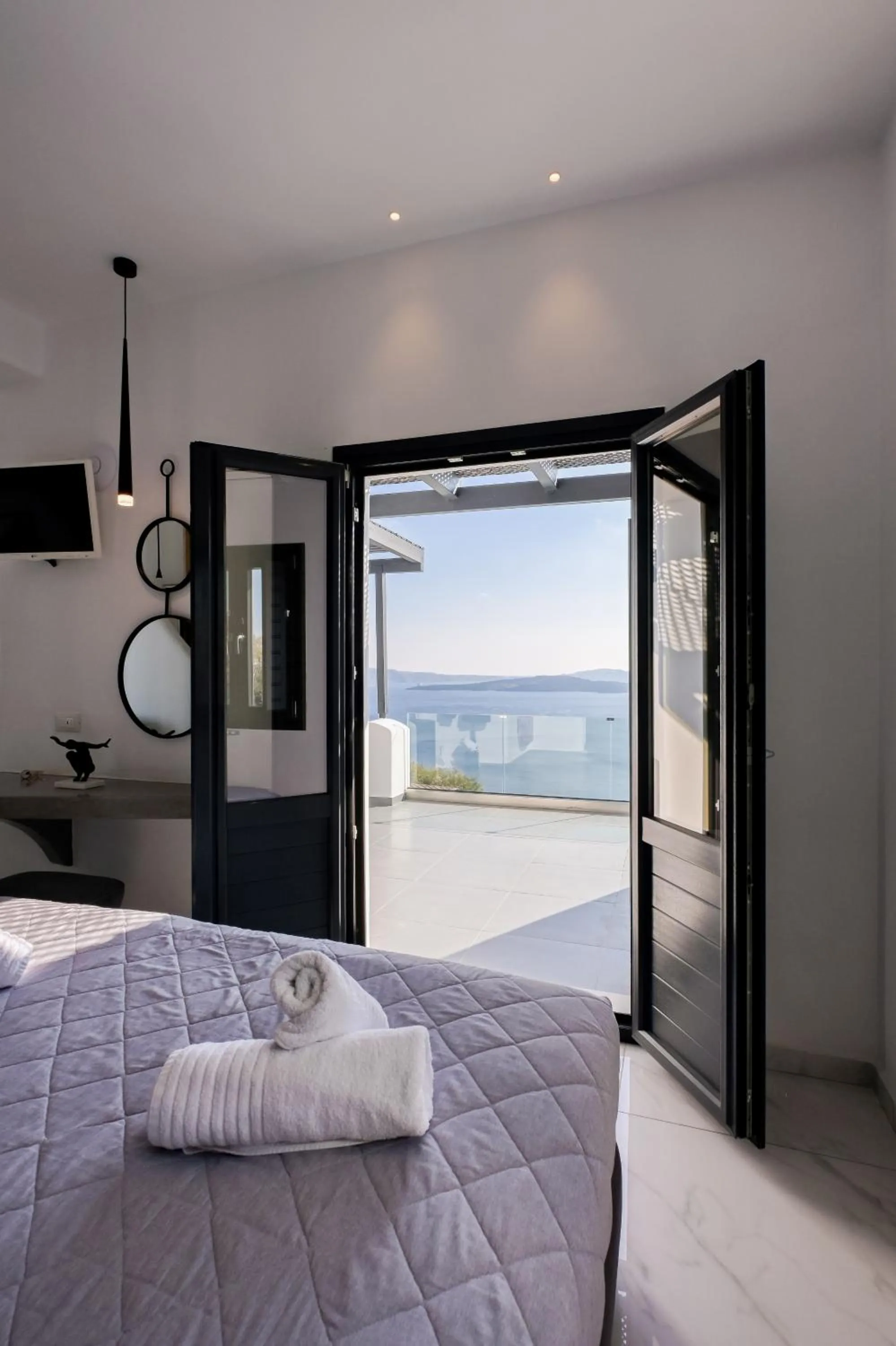 Bed in Oia Suites