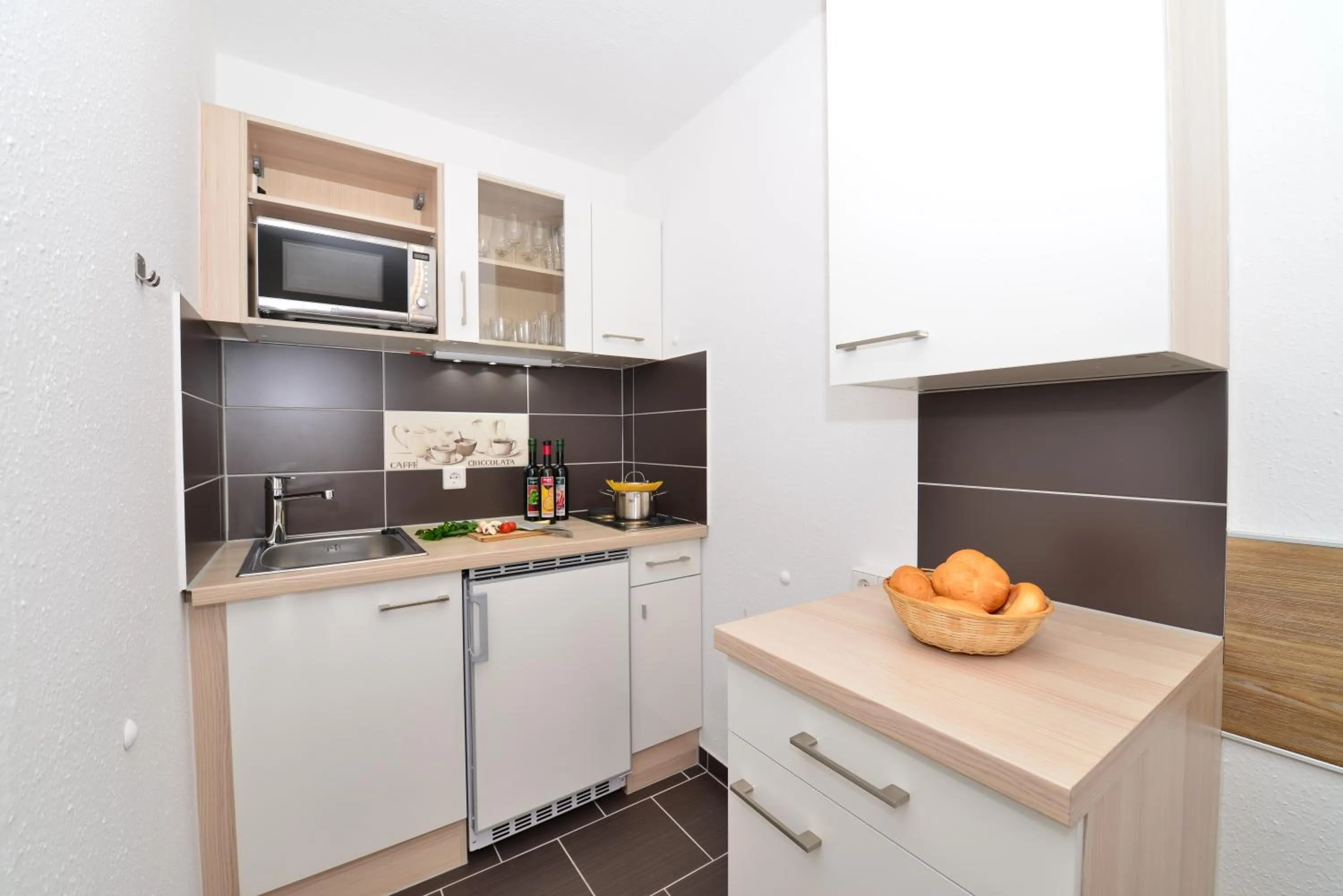 Kitchen or kitchenette in Familienhotel Kleinwalsertal