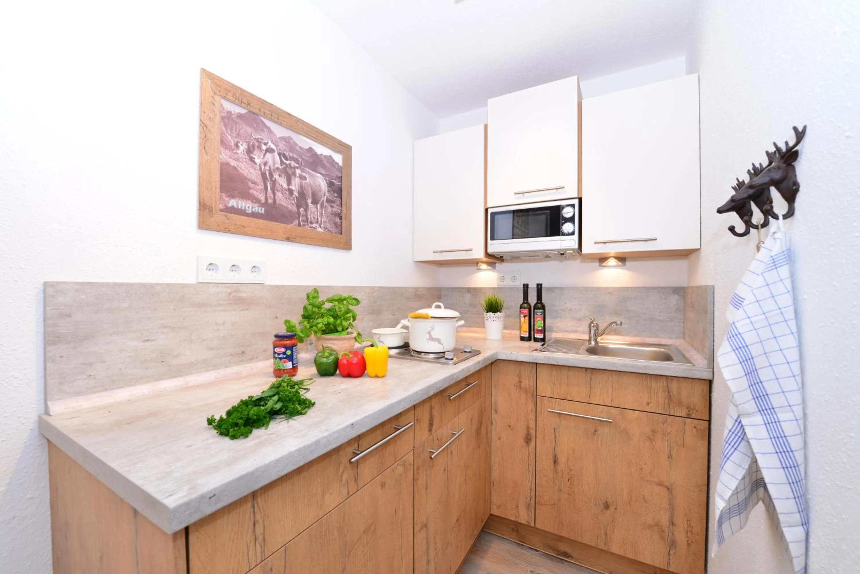 Kitchen or kitchenette in Familienhotel Kleinwalsertal