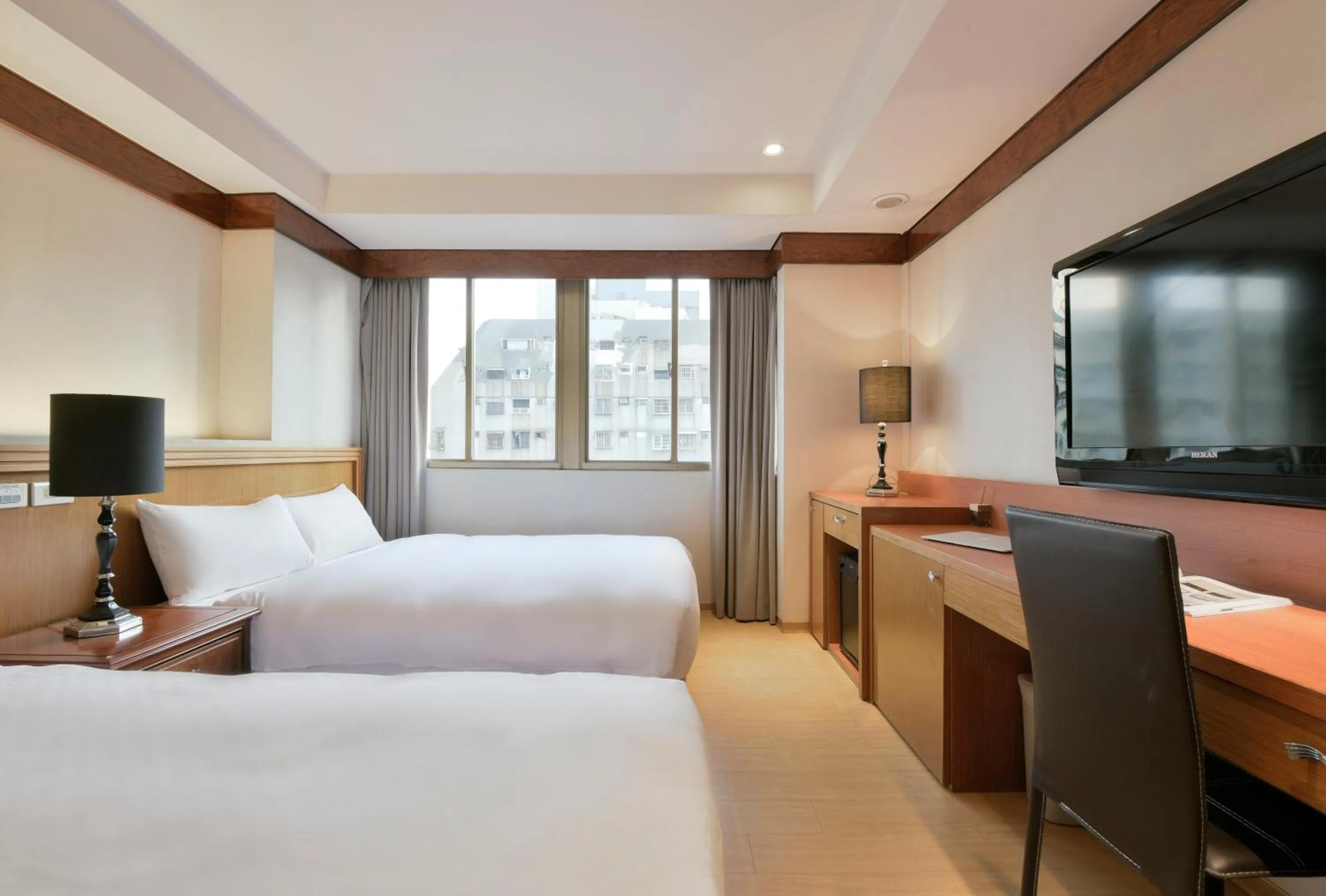 Communal lounge/ TV room, Bed in The Rivero Hotel