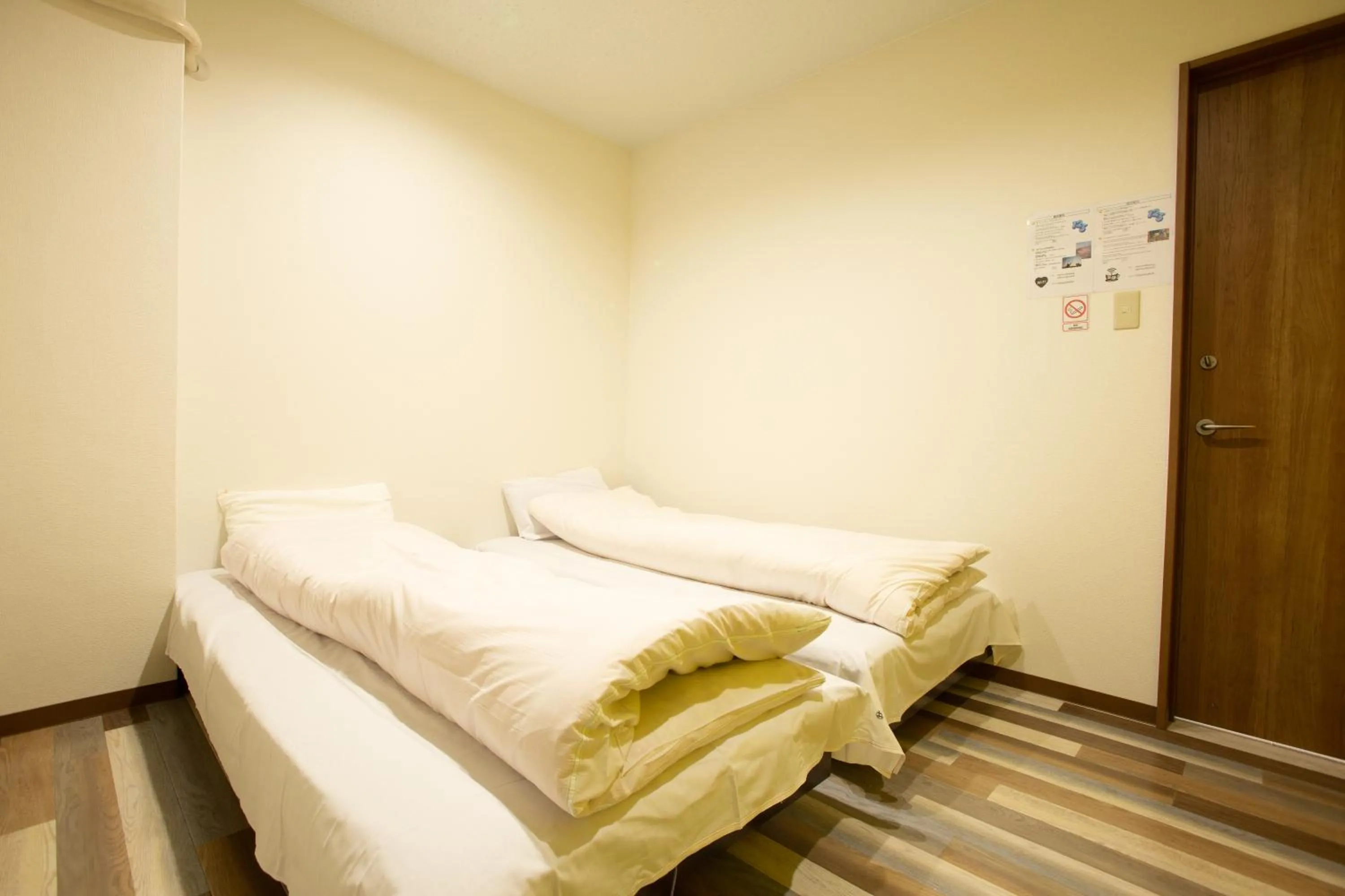 Bed in 123 Guesthouse