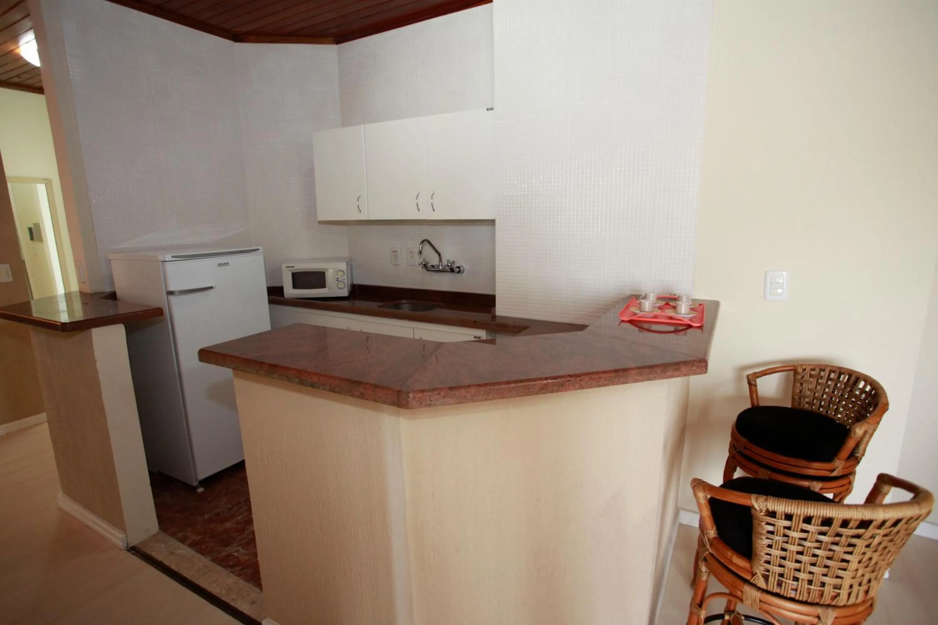 Kitchen or kitchenette in Sky Ville Hotel Canela