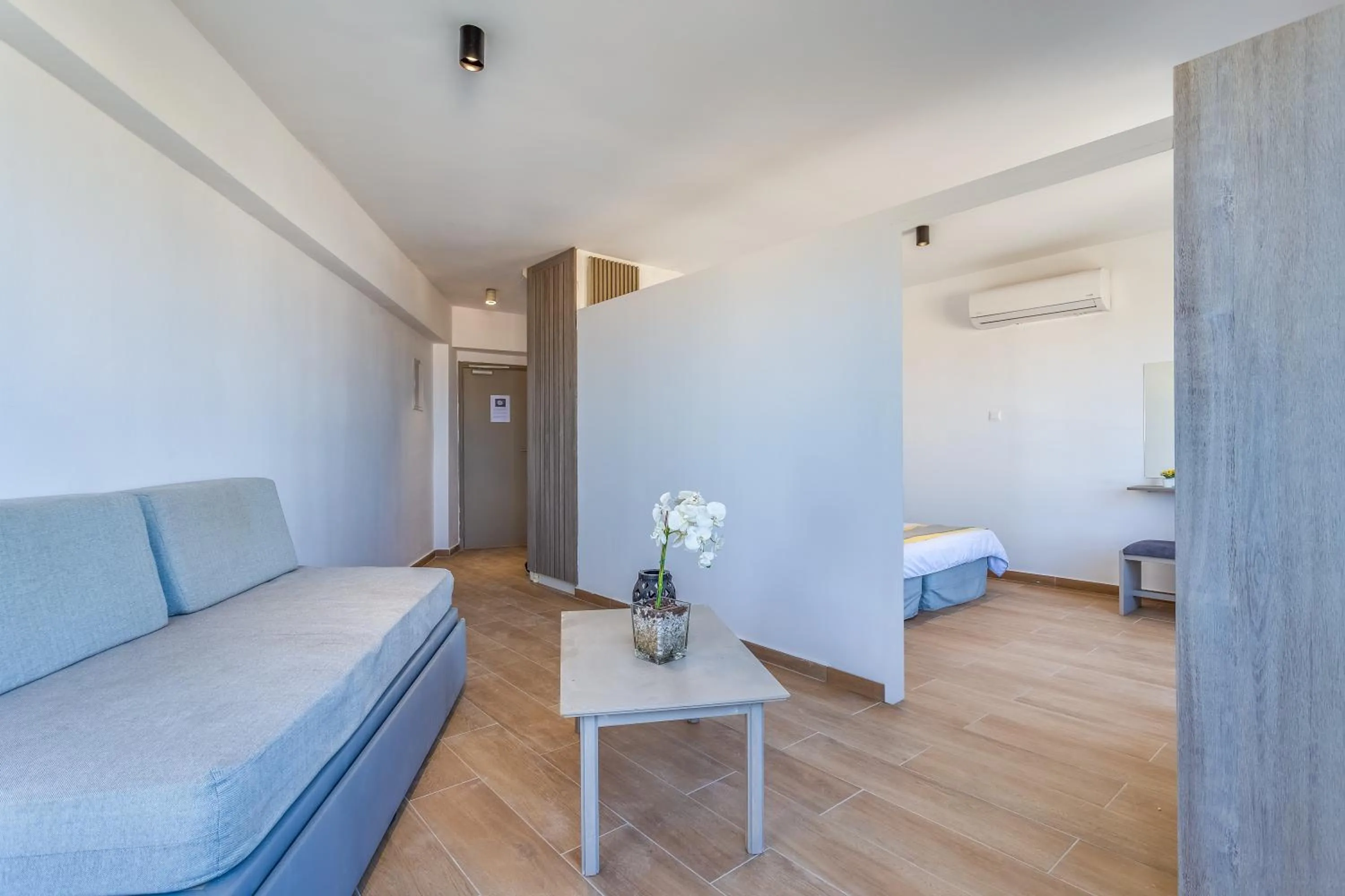 Living room, Bed in Toxotis Hotel