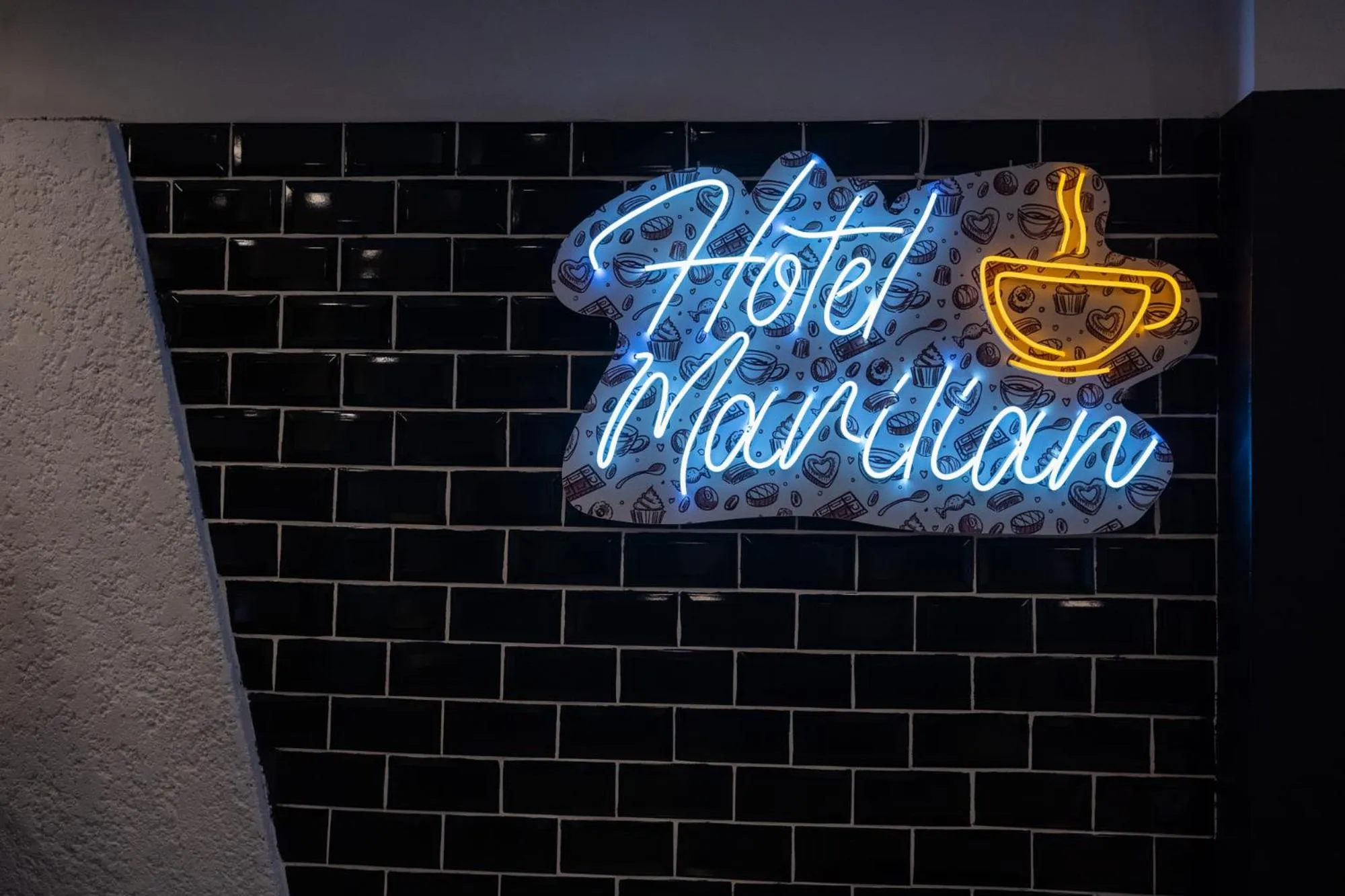 Property logo or sign in Hotel Marilian