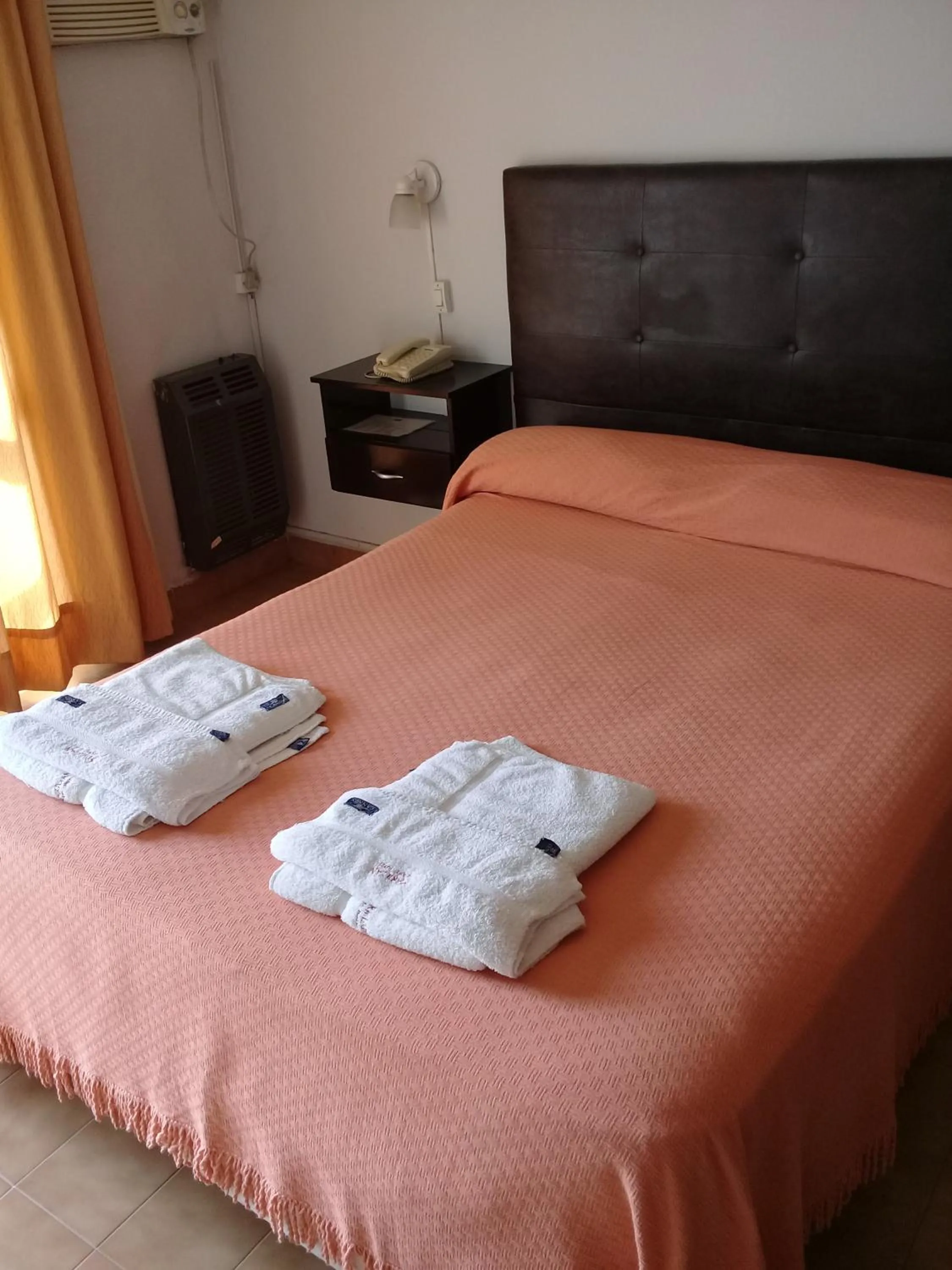 Bed in Apart Hotel Marilian