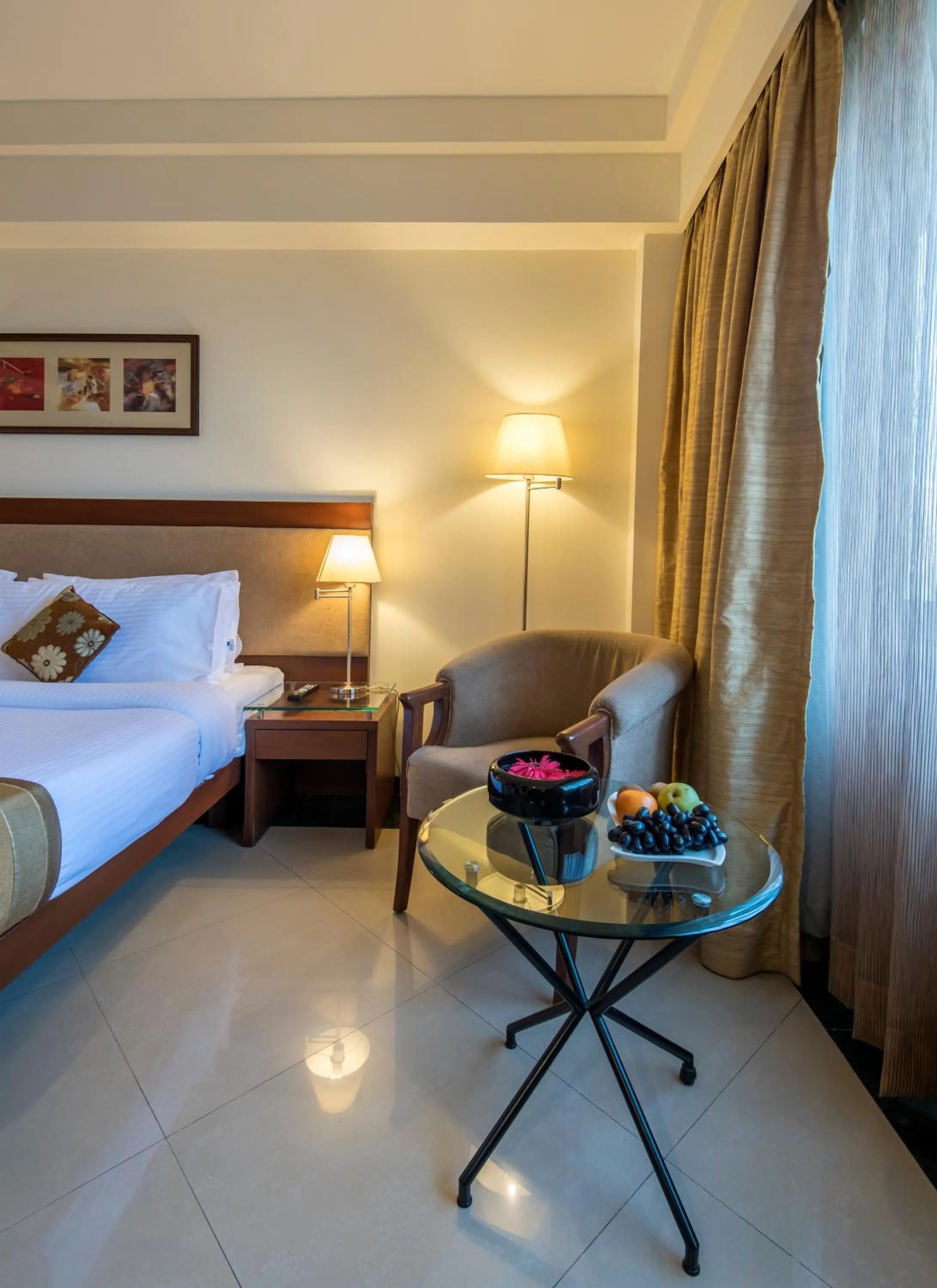 Seating area, Bed in Park Ornate Hotel Viman Nagar