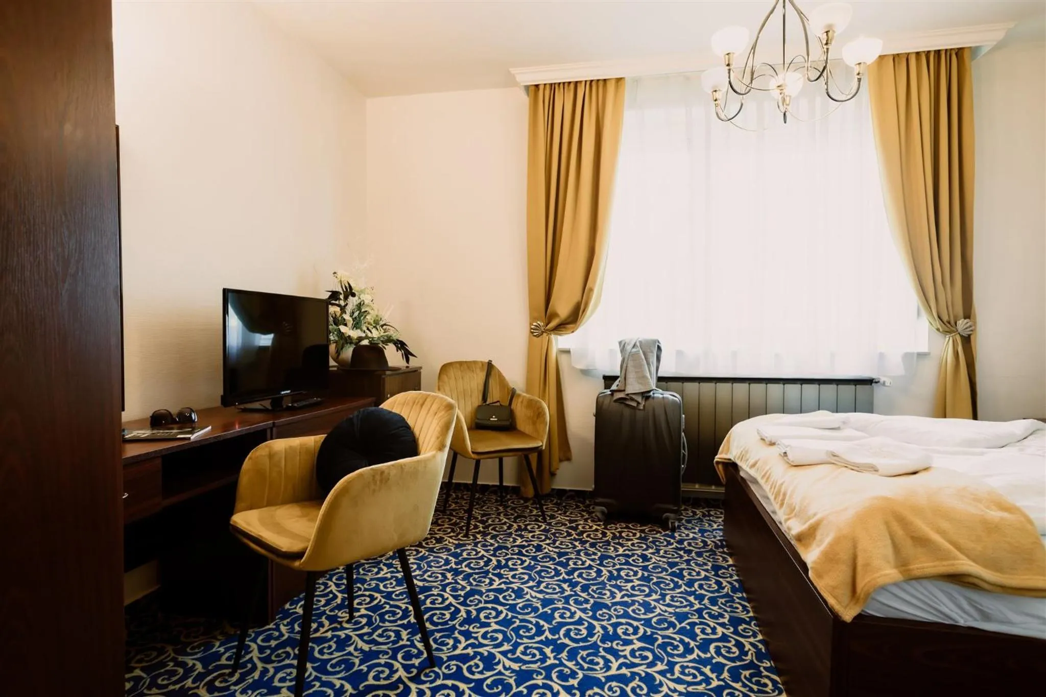 TV and multimedia, Bed in Korona Pension and Restaurant