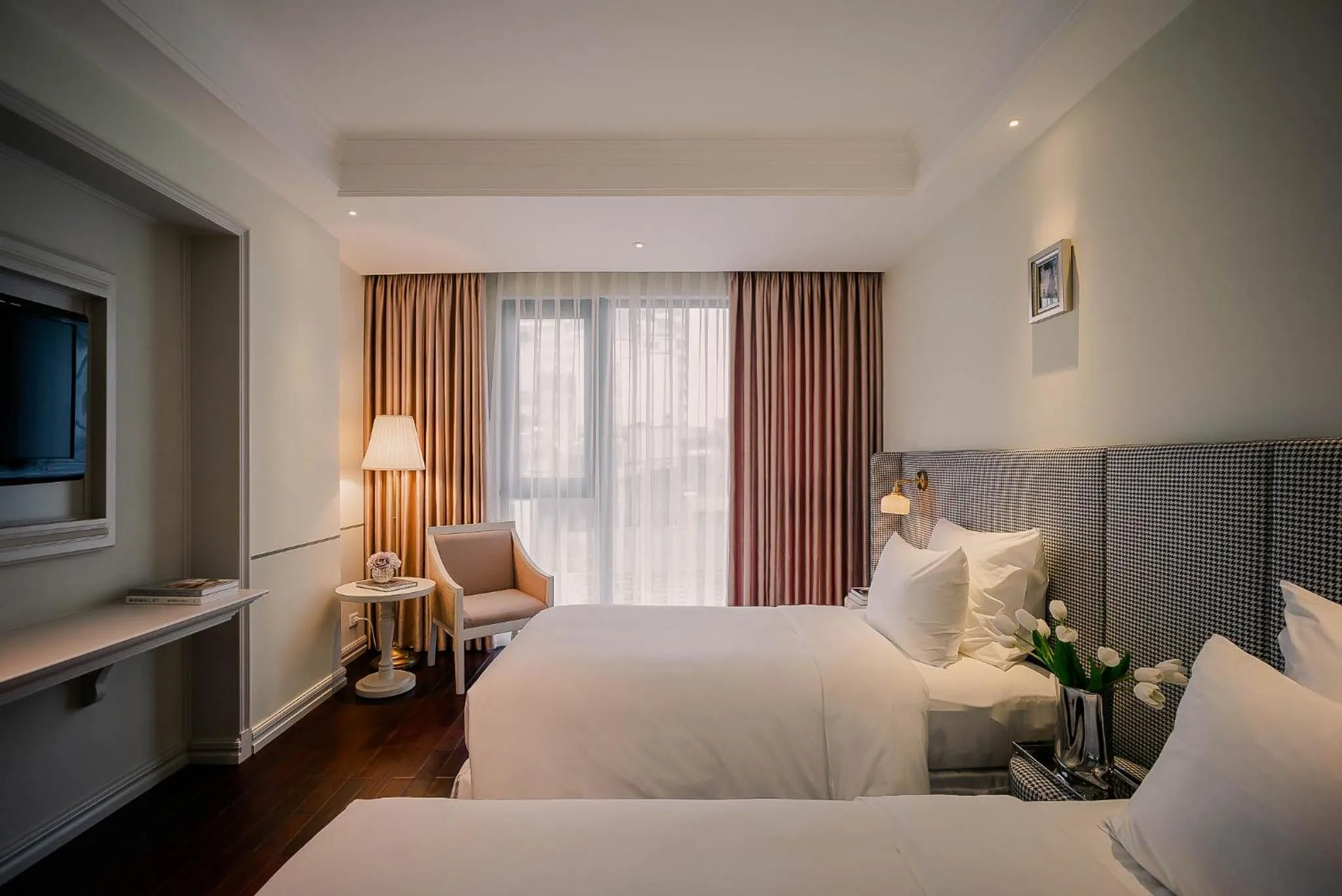 Bed in Le Jardin Hotel Haute Couture