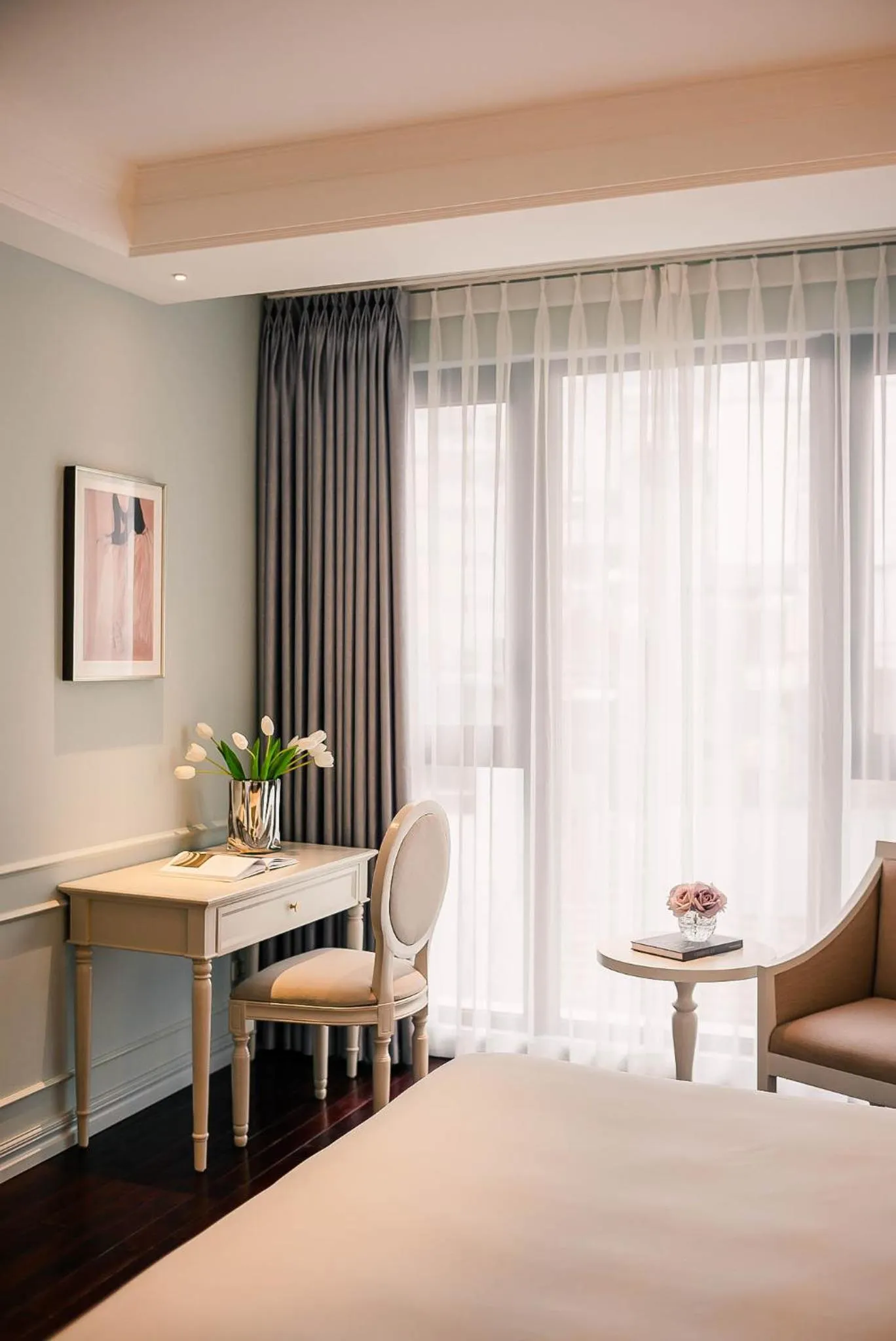 Bed in Le Jardin Hotel Haute Couture