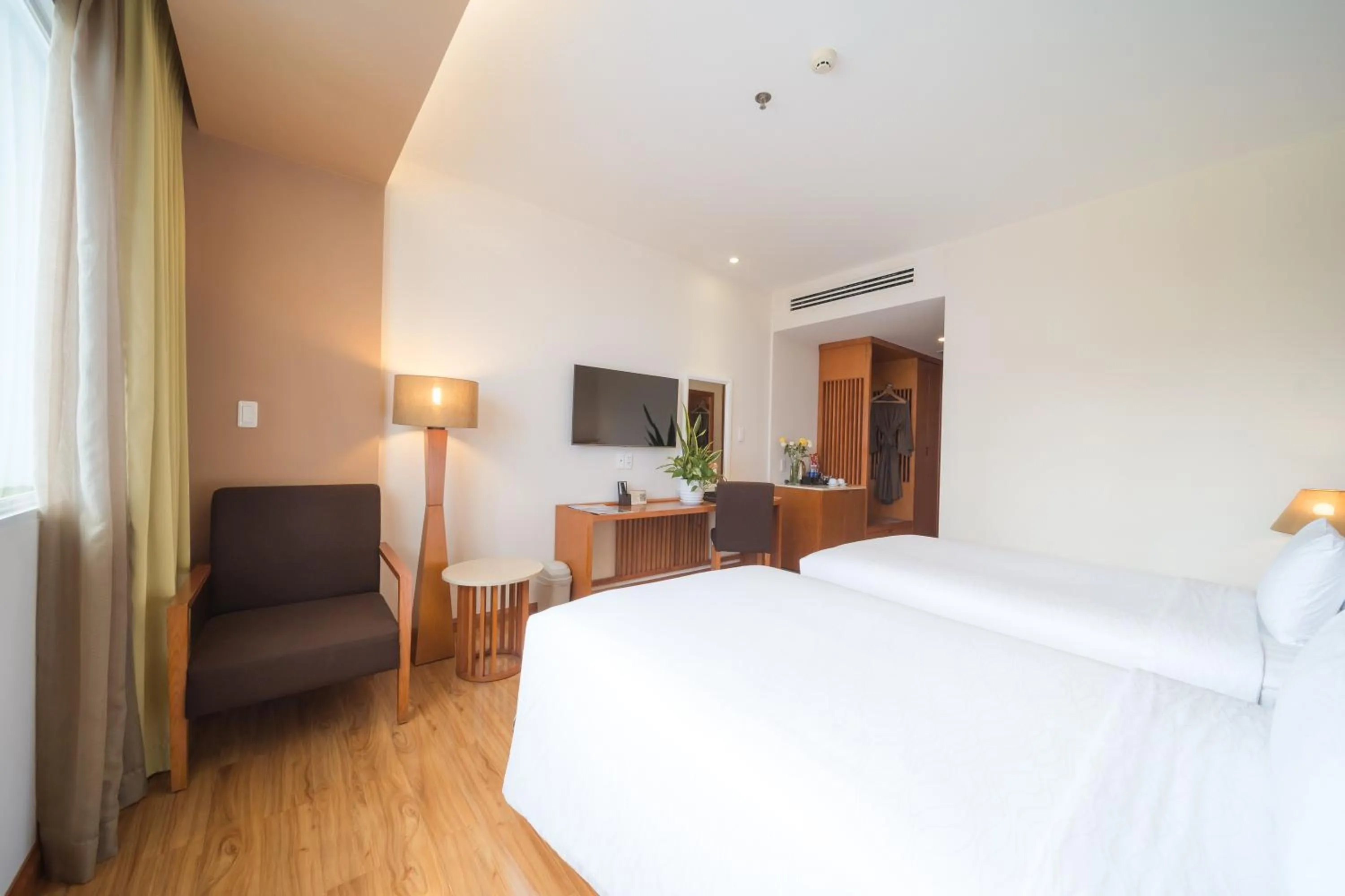 Photo of the whole room, Bed in Saigon Hotel