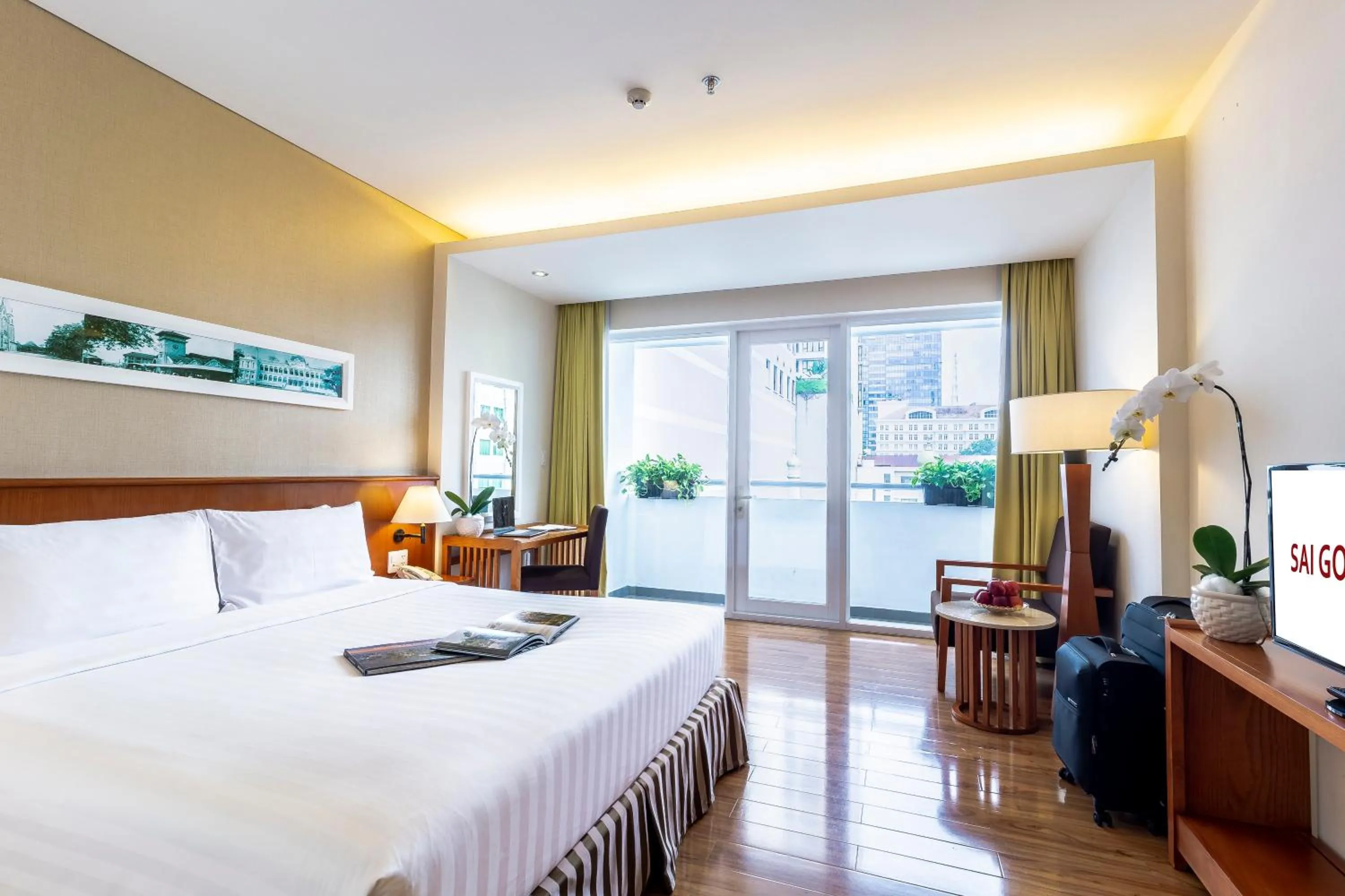 Photo of the whole room, Bed in Saigon Hotel