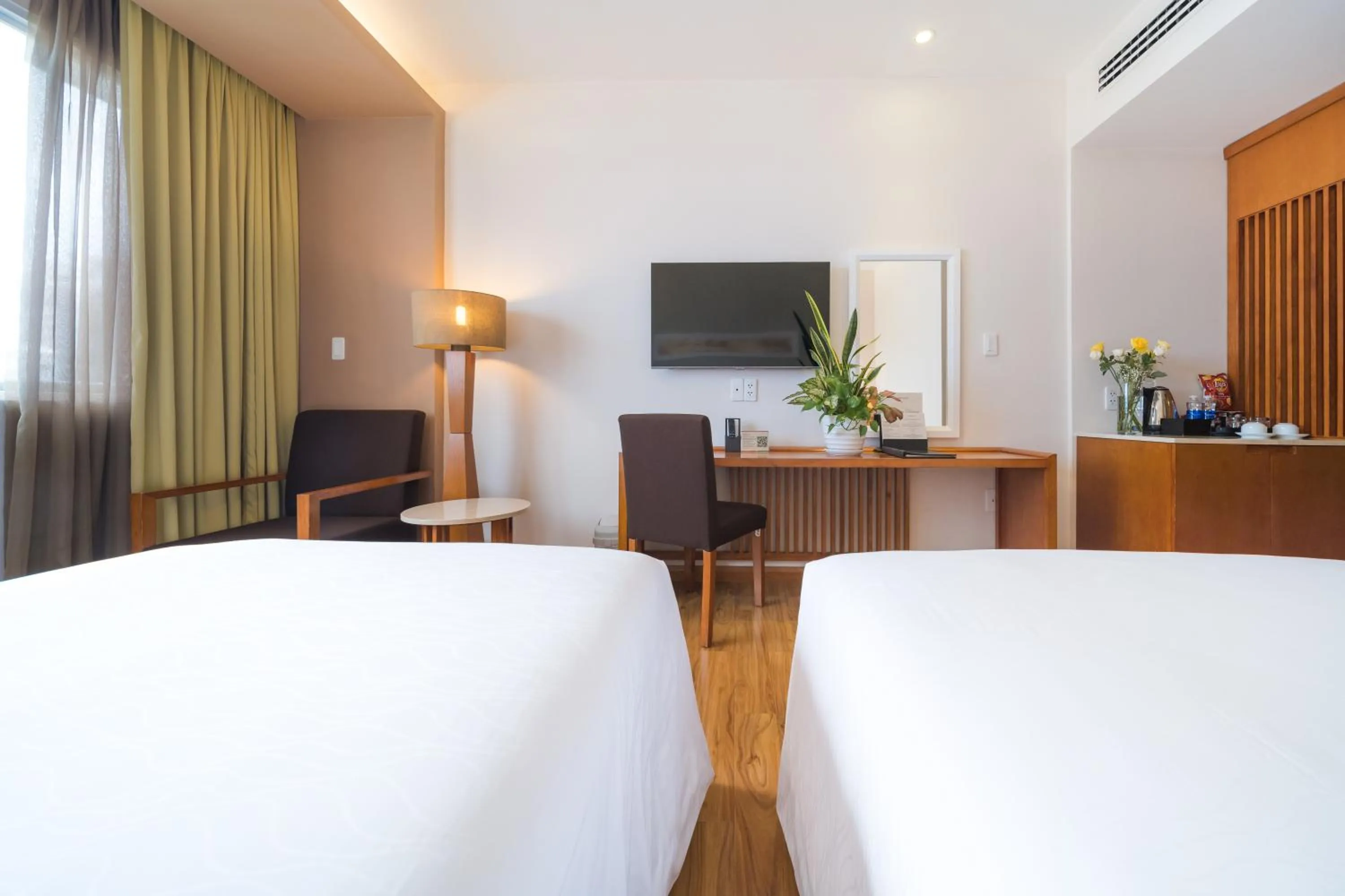 Living room, Bed in Saigon Hotel