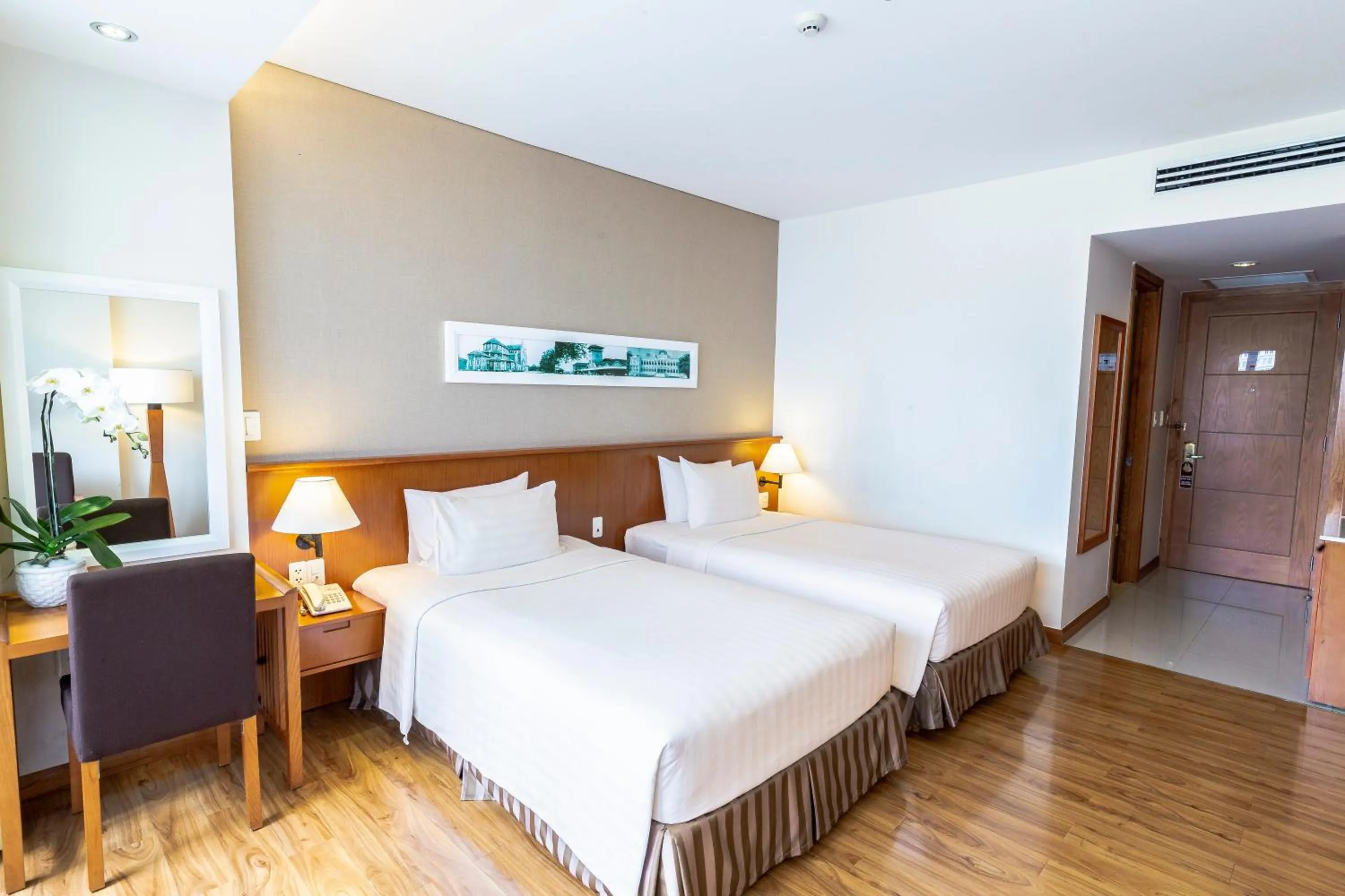 Photo of the whole room, Bed in Saigon Hotel