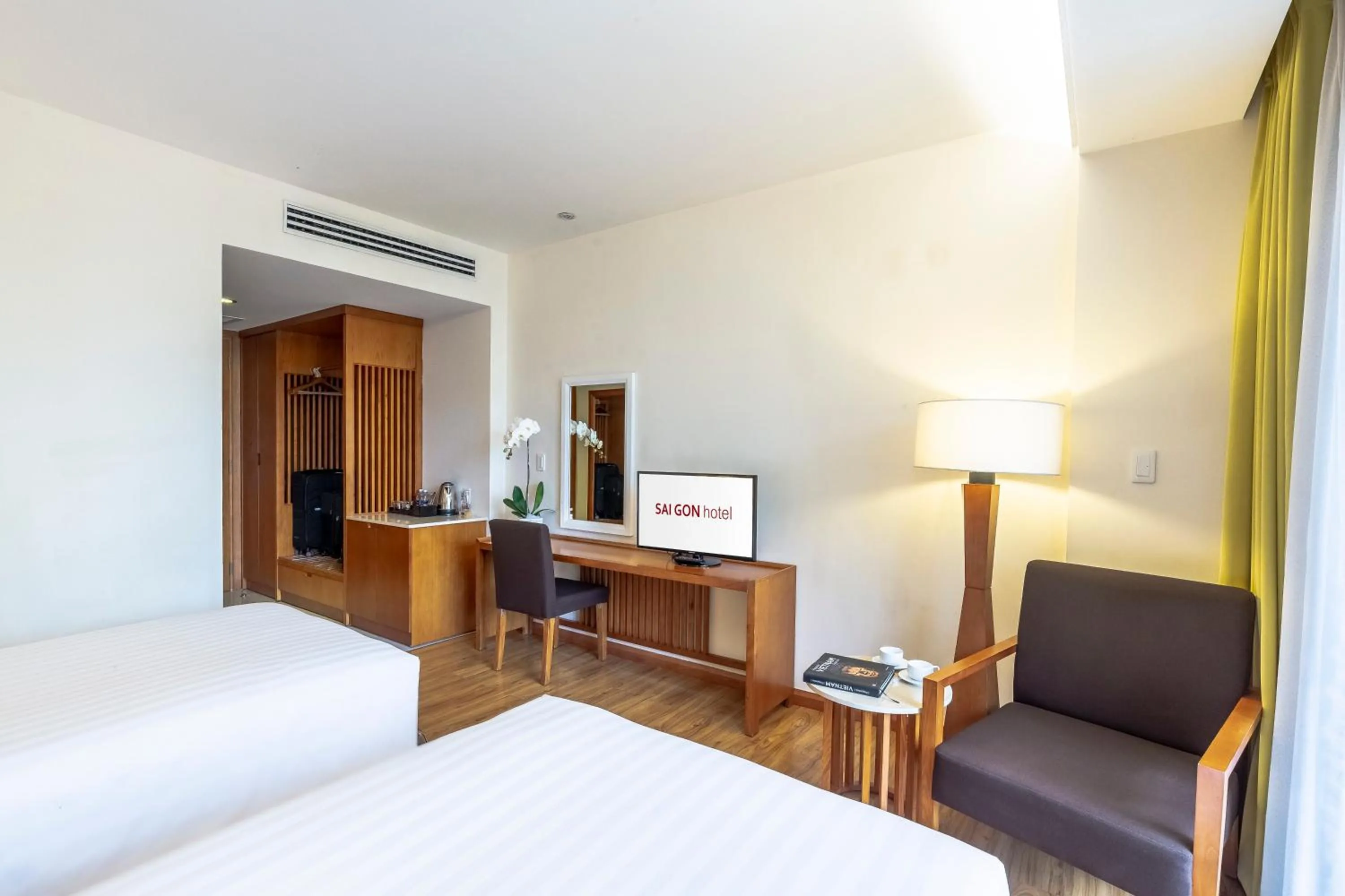 Photo of the whole room, Bed in Saigon Hotel