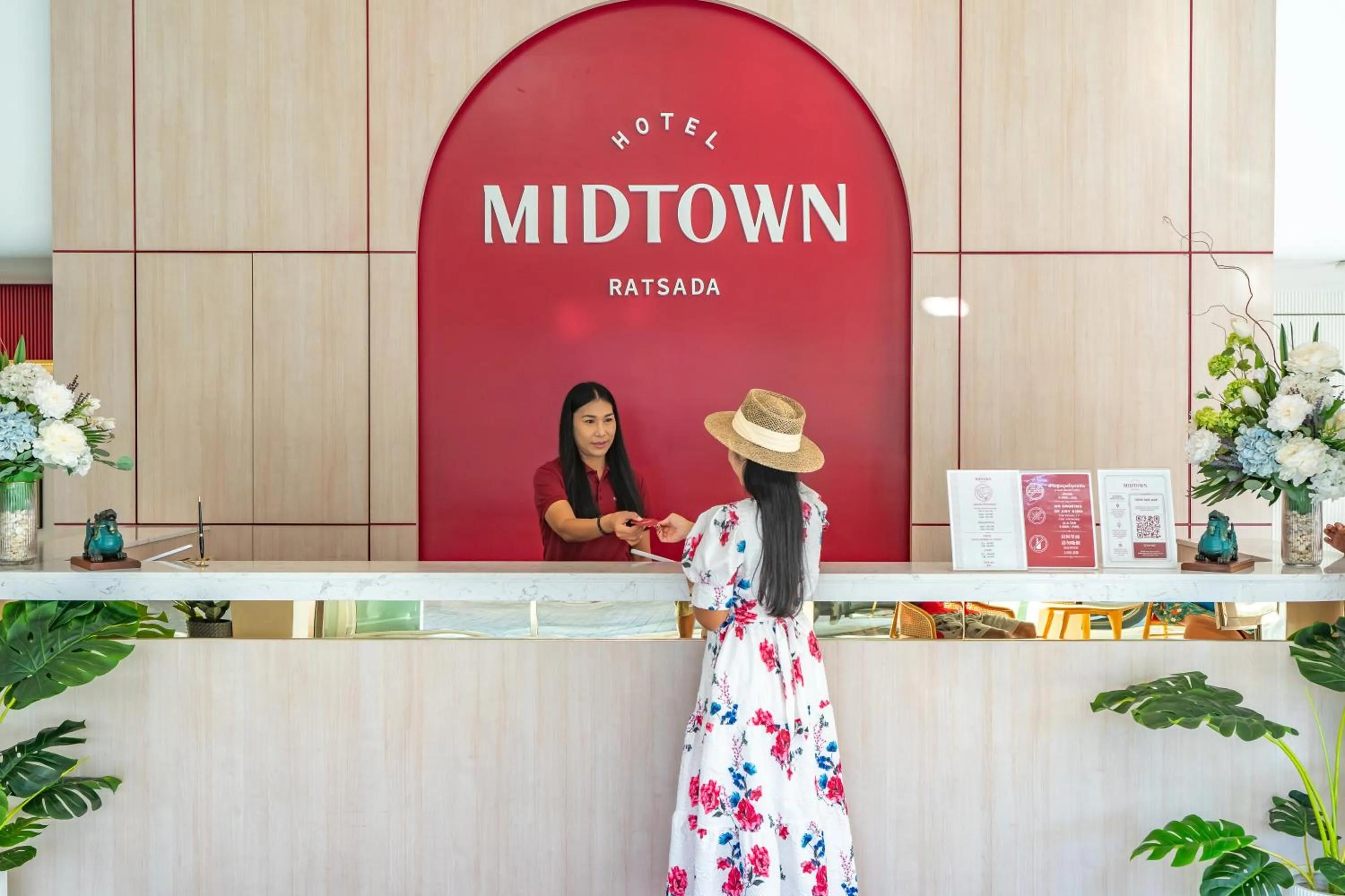 Property logo or sign in Hotel Midtown Ratsada