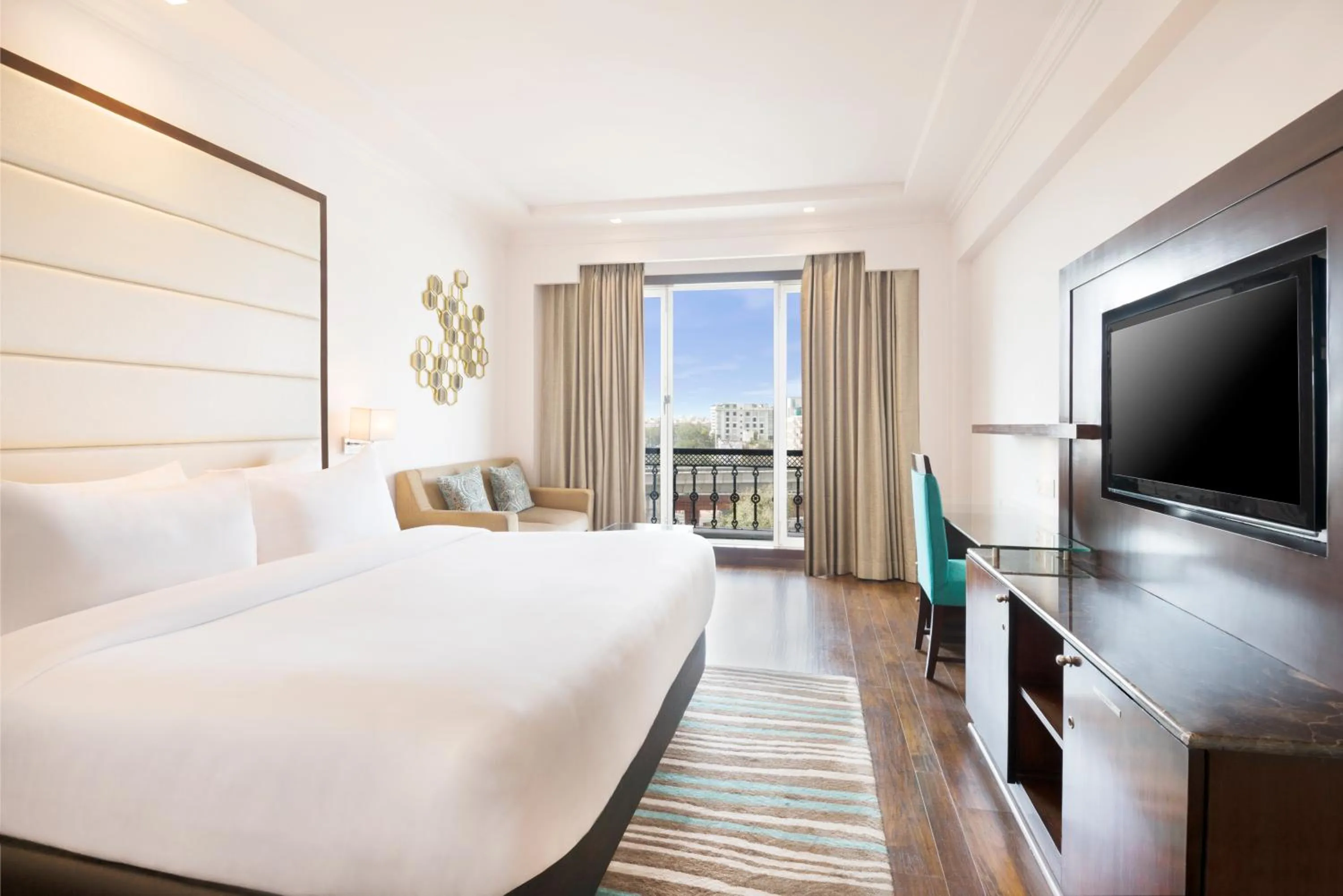 Photo of the whole room, Bed in Radisson Jaipur City Center