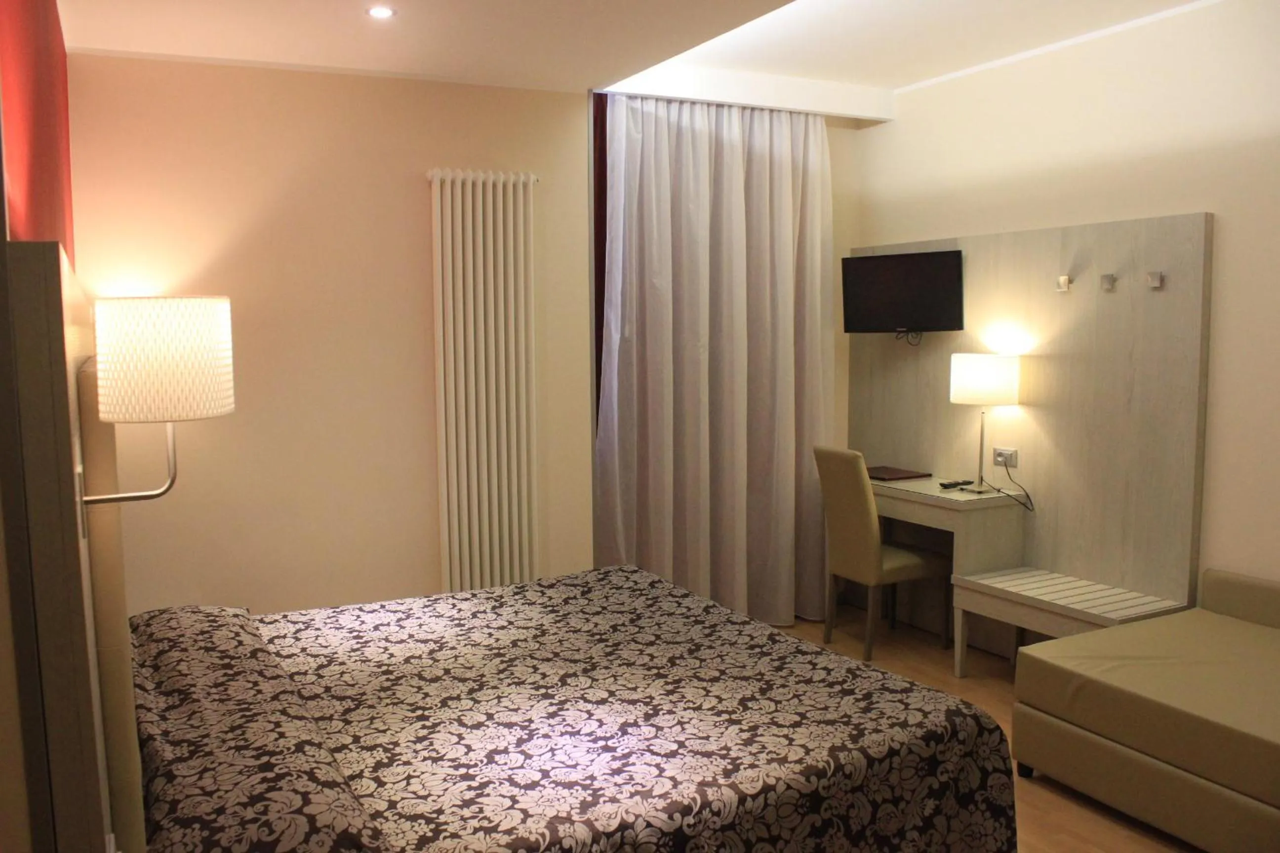 Photo of the whole room, Bed in Hotel Baffo Rosso