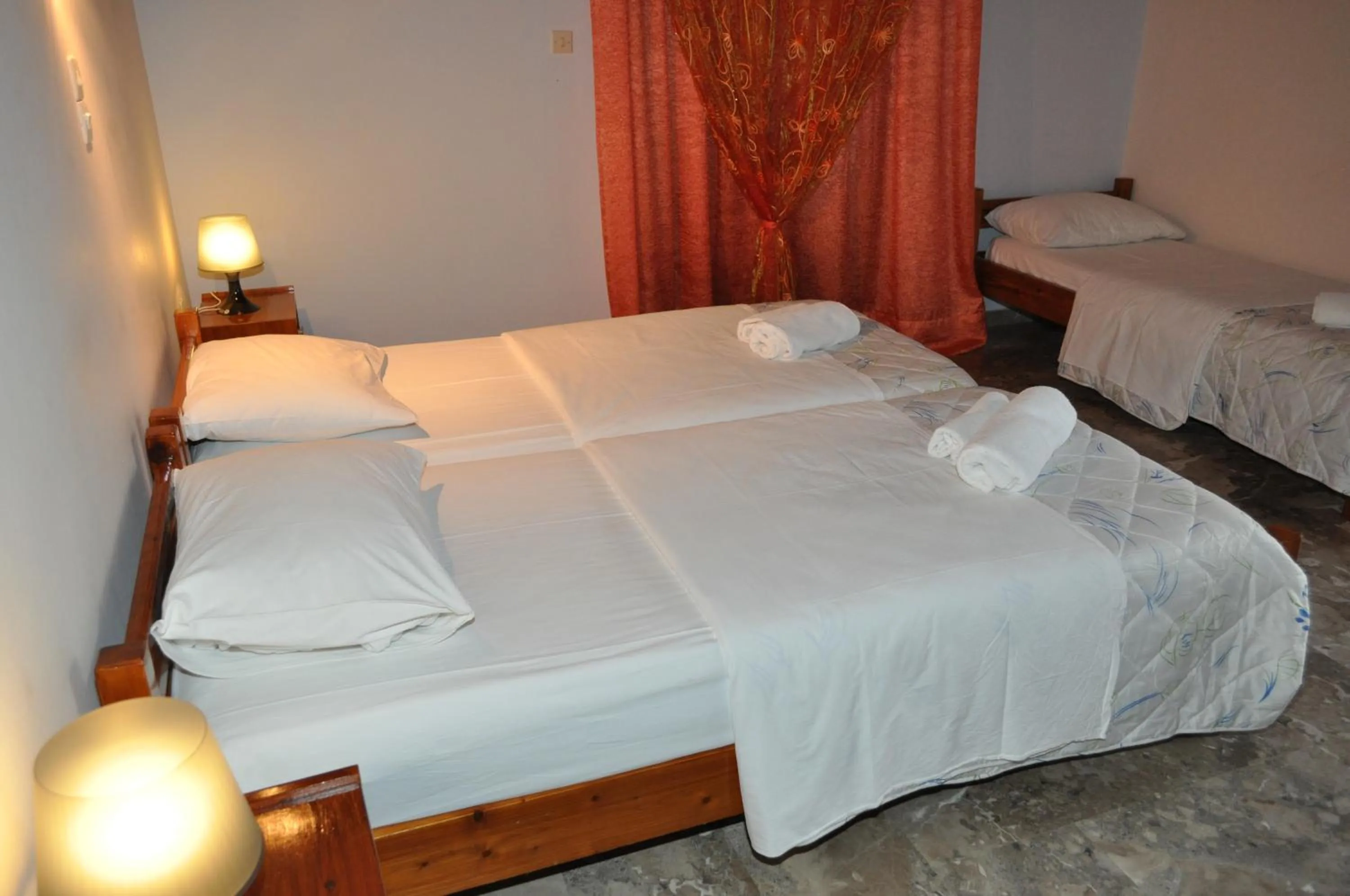 Photo of the whole room, Bed in Olympion Village Studios