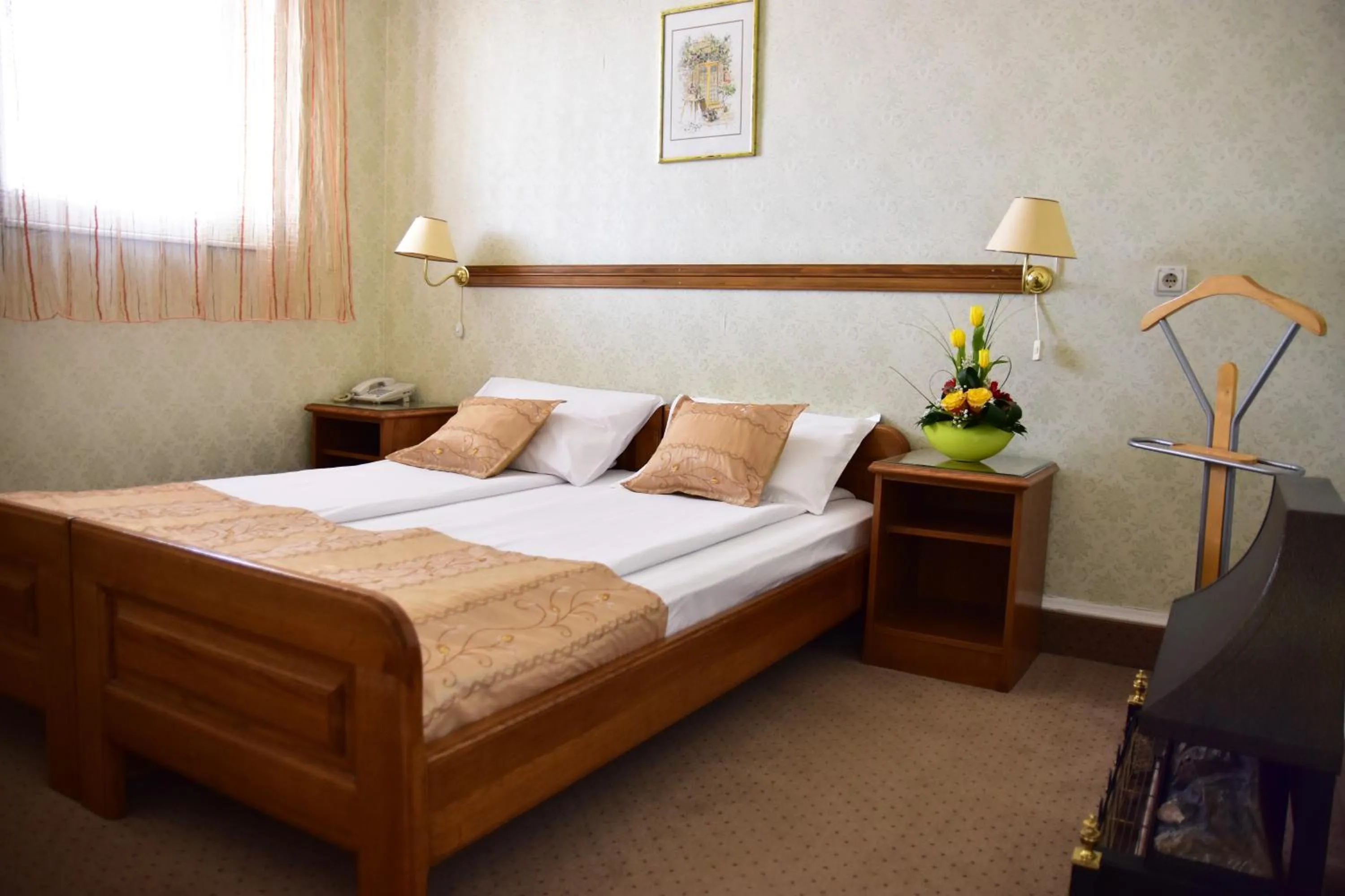 Bed in Garni Hotel Lav