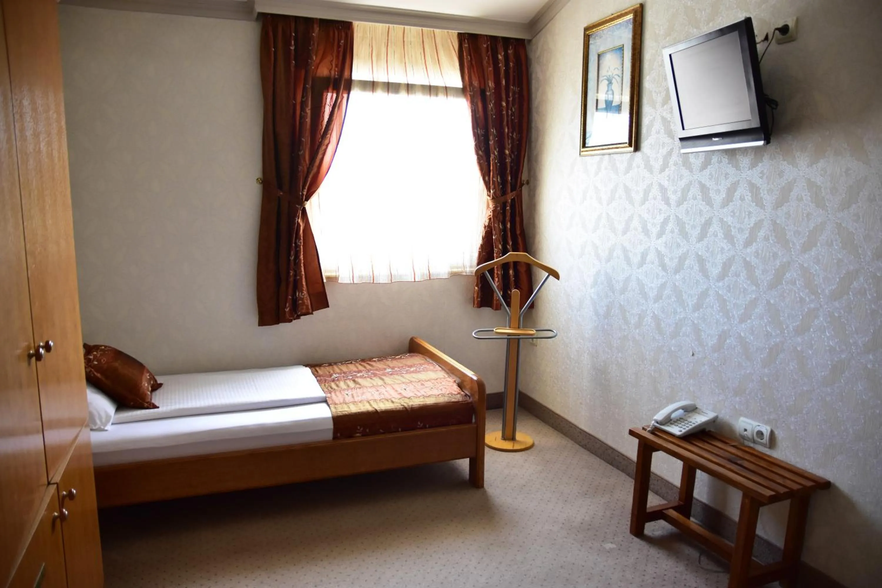 Bed in Garni Hotel Lav