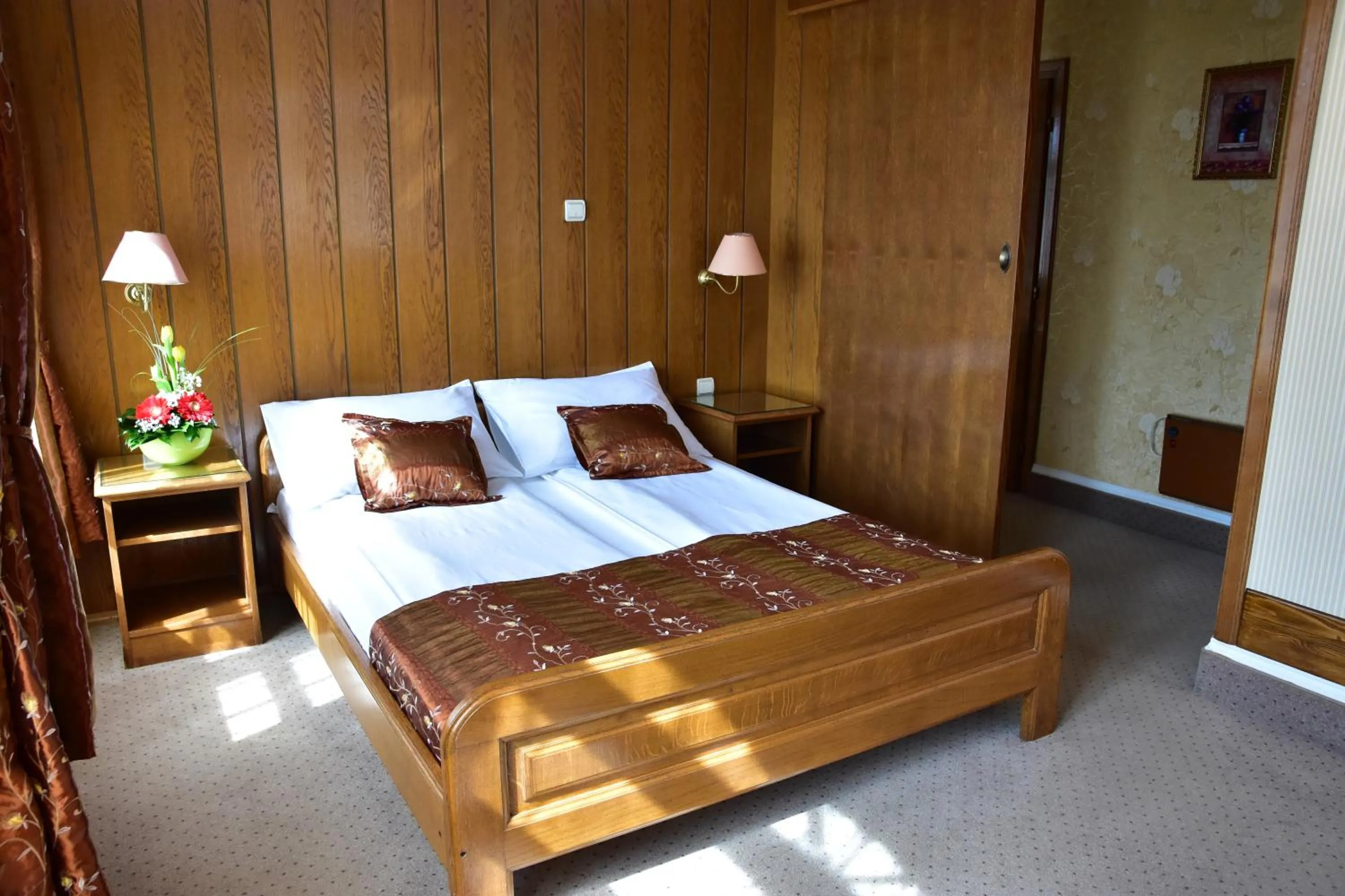 Bed in Garni Hotel Lav