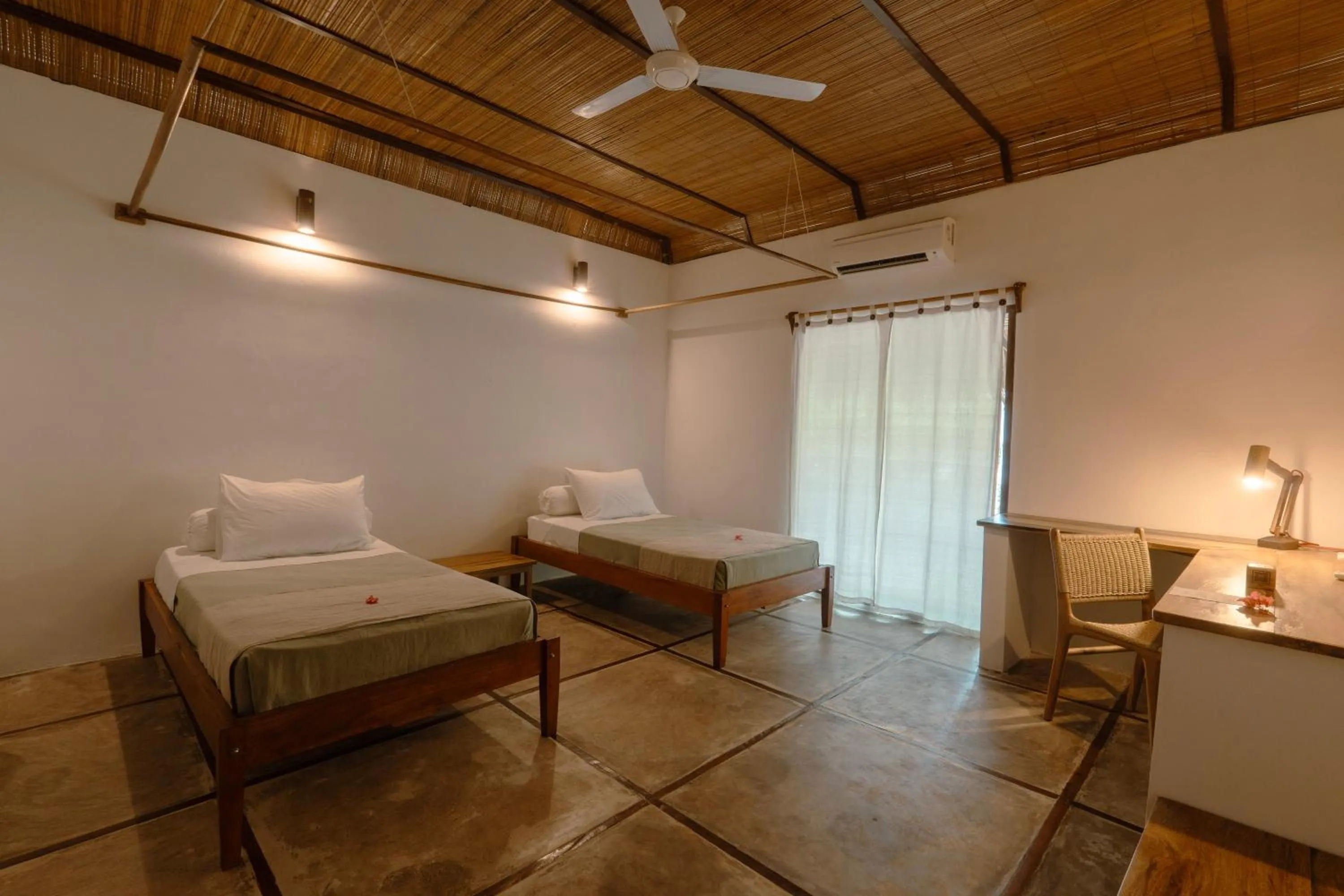 Bedroom, Bed in Coral Eye Boutique Resort and Marine Outpost