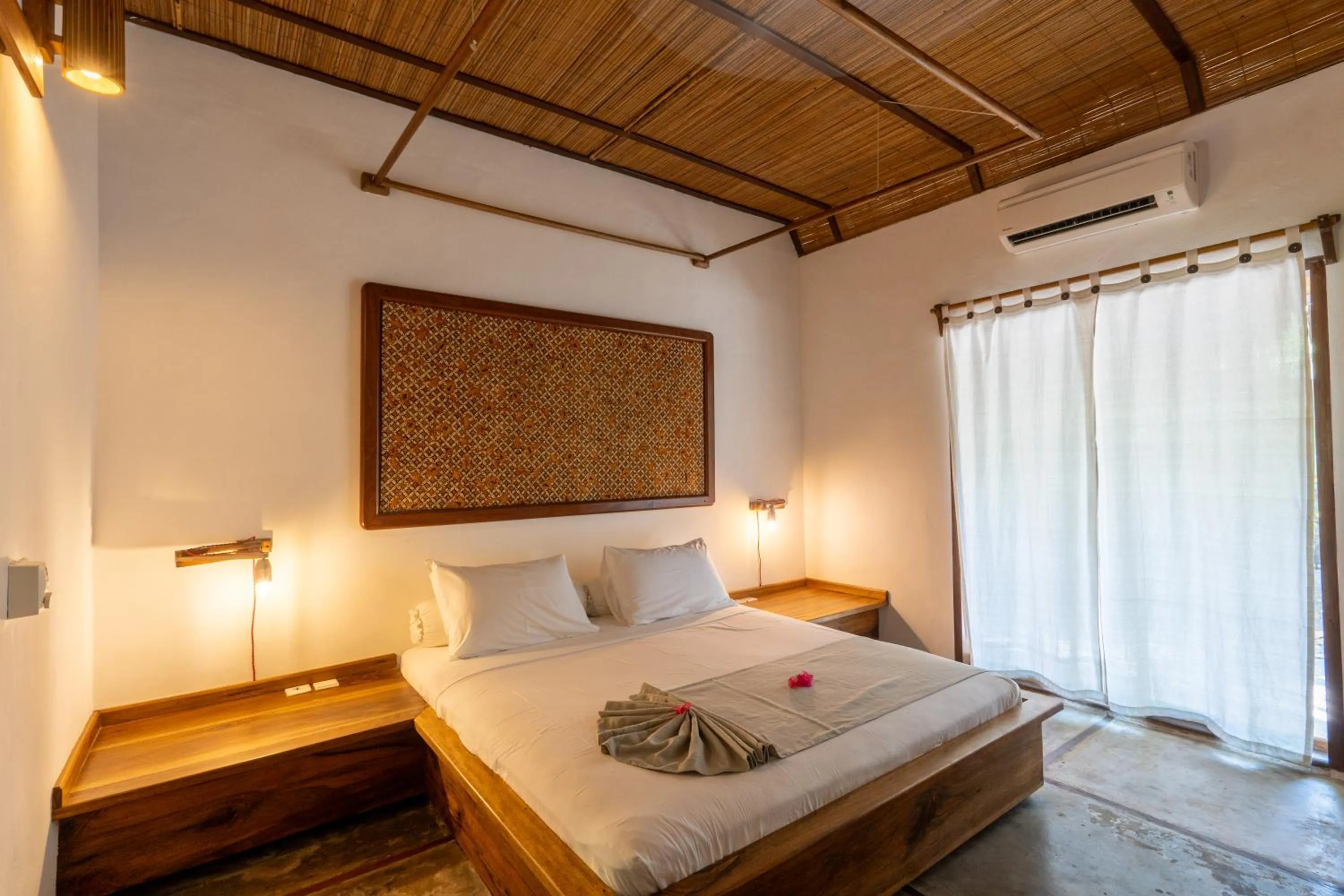 Bedroom, Bed in Coral Eye Boutique Resort and Marine Outpost