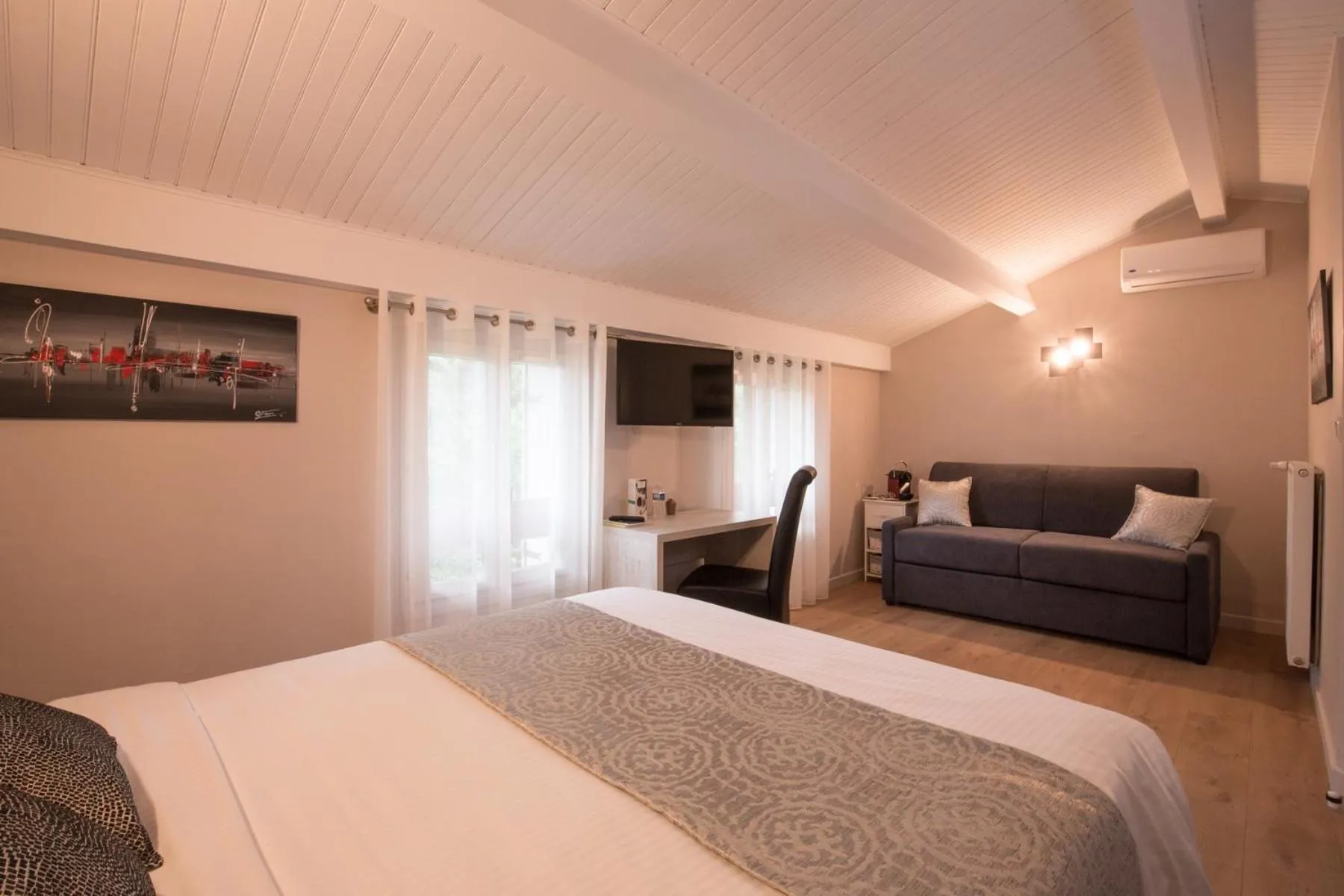 Photo of the whole room, Bed in Logis Hotel Le Petit Casset
