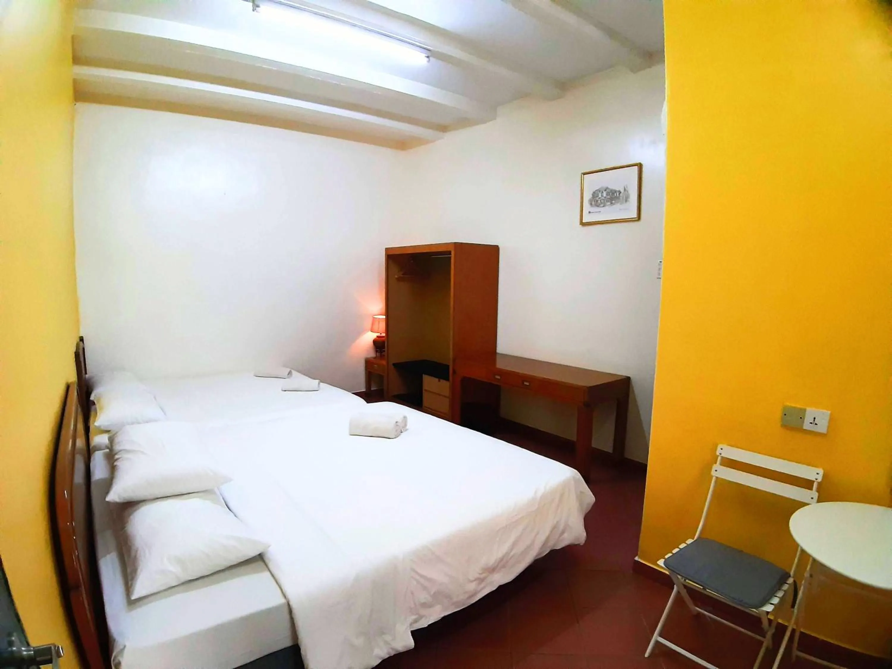 Bed in Heeren Inn Melaka