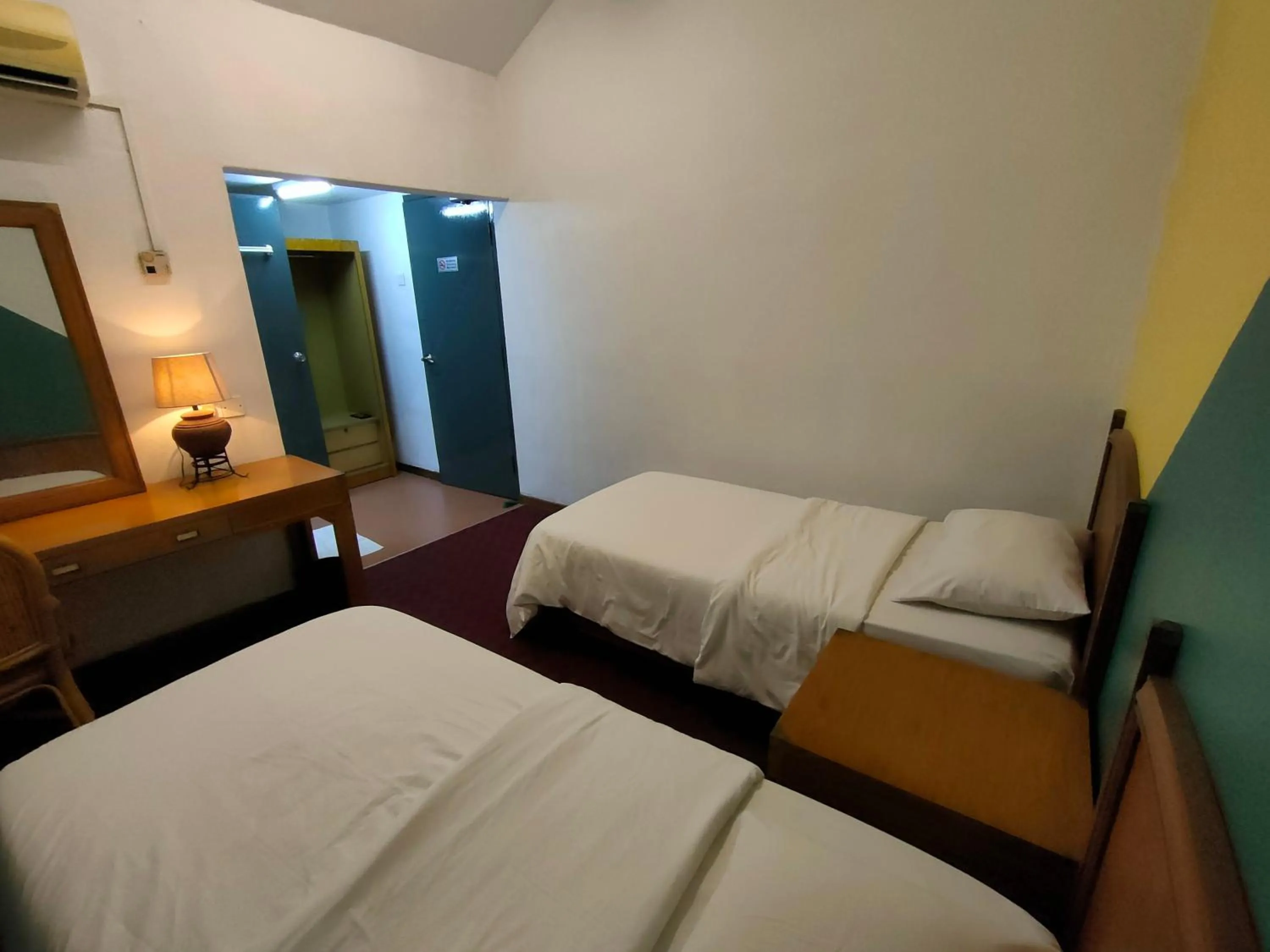 Bed in Heeren Inn Melaka