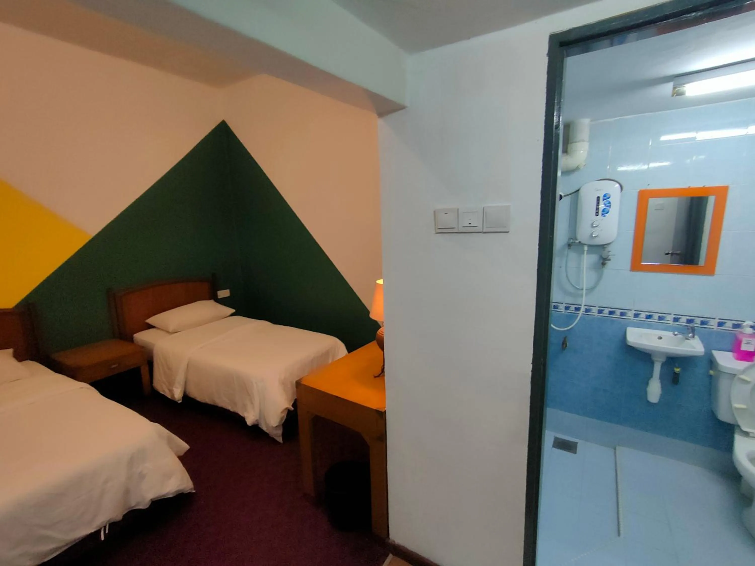 Bed in Heeren Inn Melaka