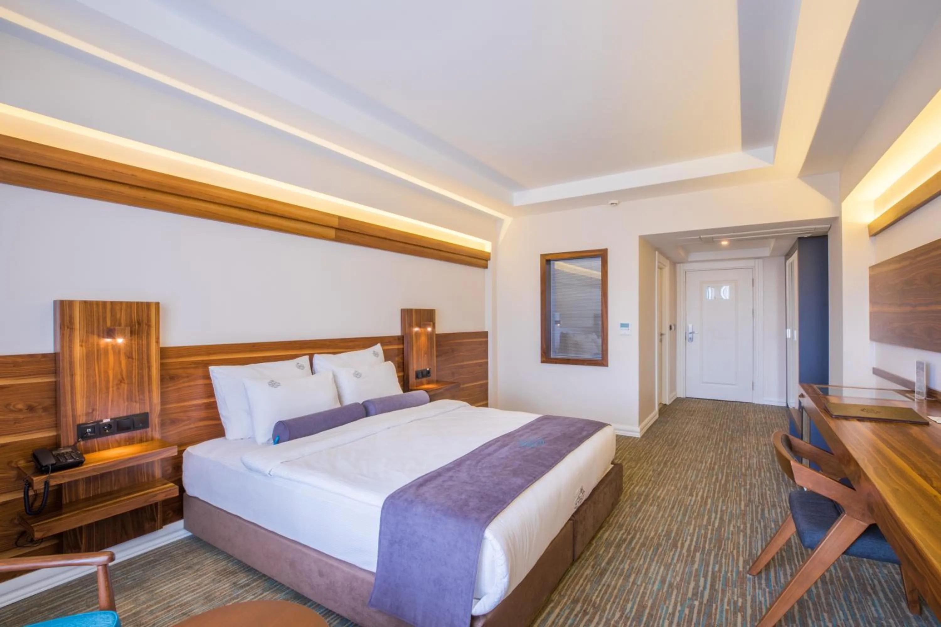 Bed in Karpalas City Hotel & Spa