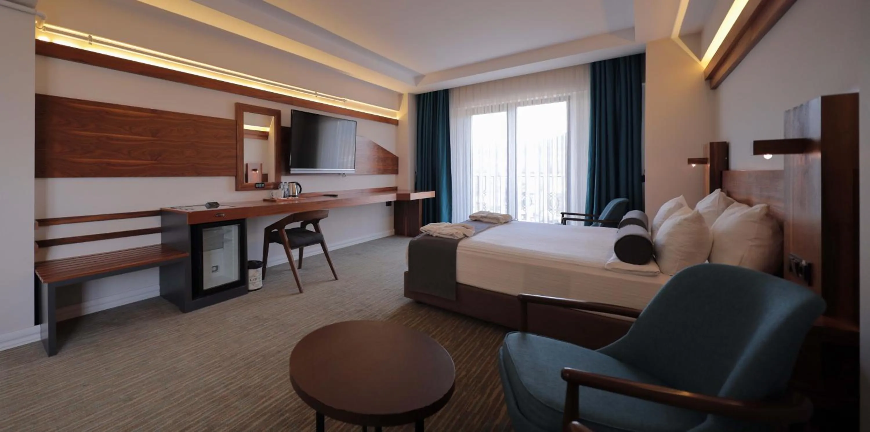 Bed in Karpalas City Hotel & Spa