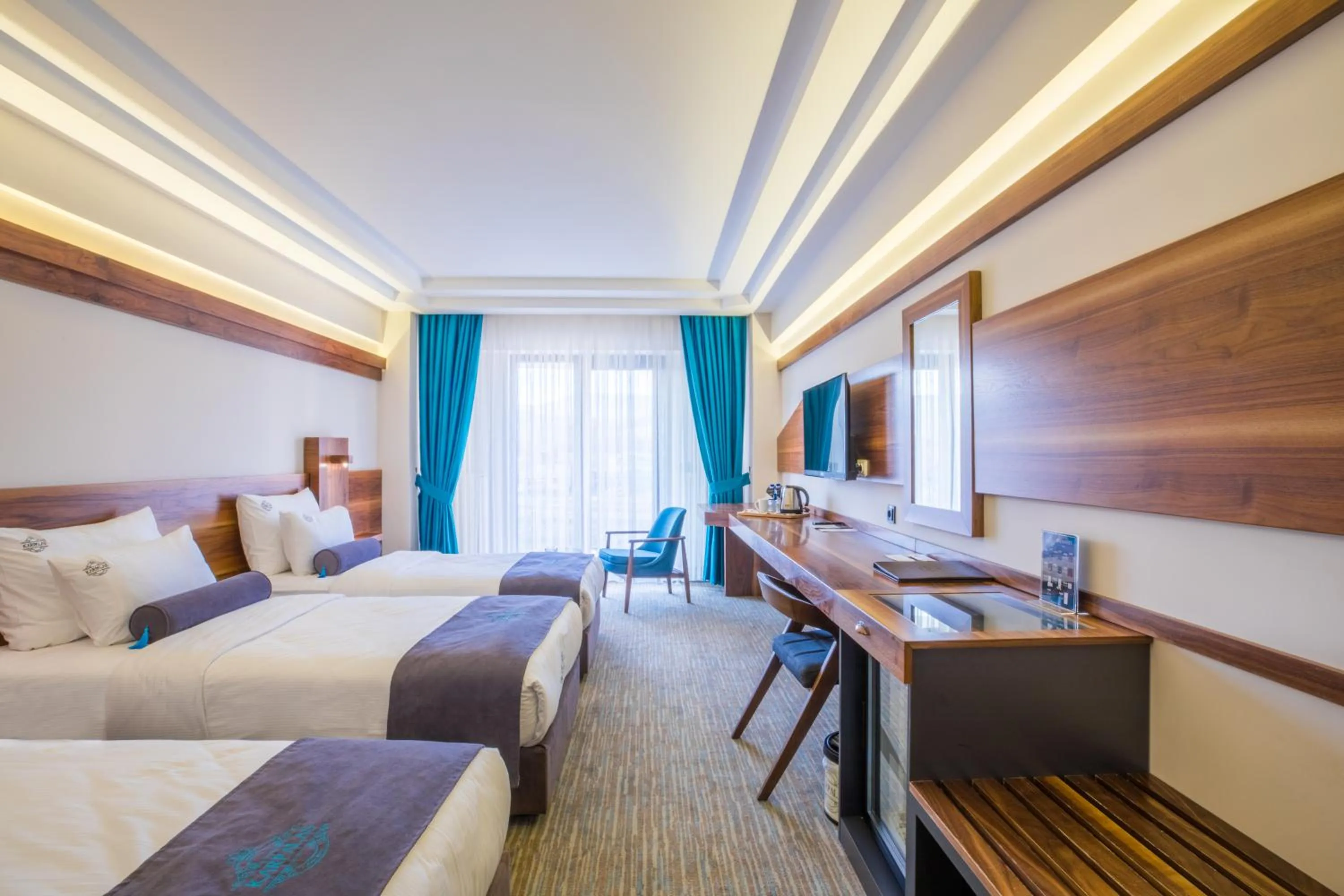 Bed in Karpalas City Hotel & Spa