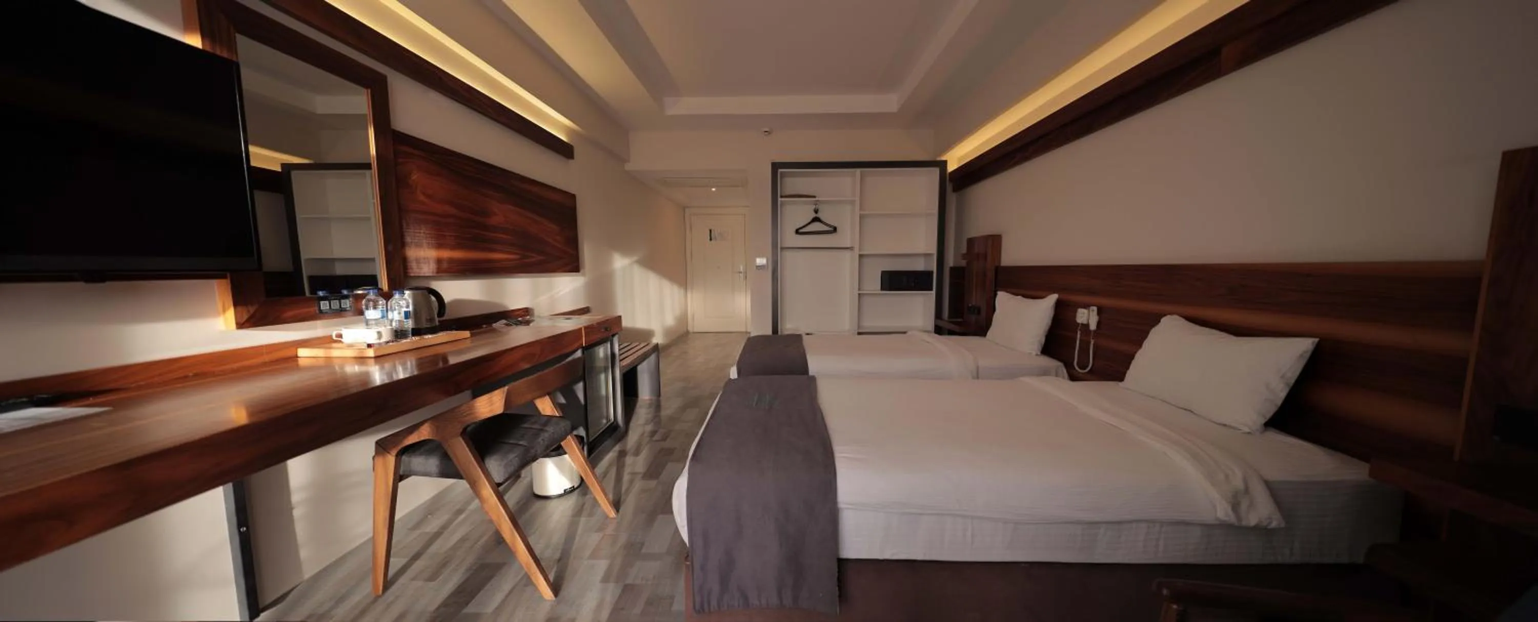 Bed in Karpalas City Hotel & Spa