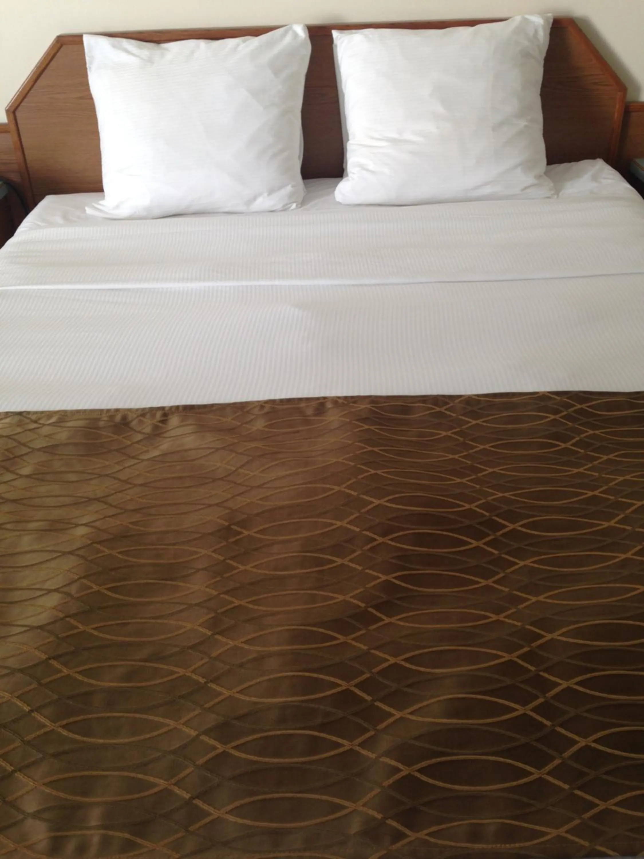 Bed in The Ranchland Inn Kamloops