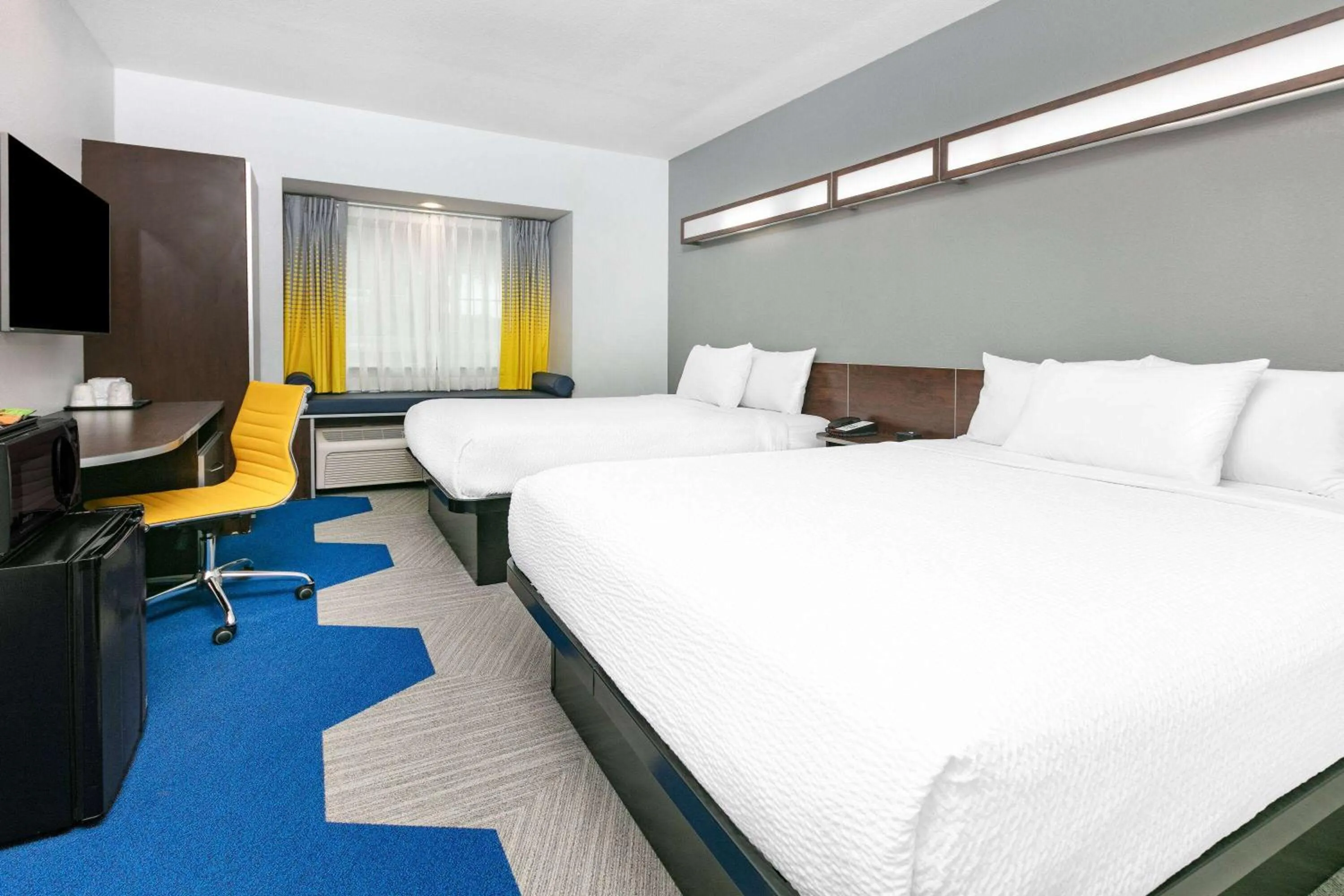 Bed in Microtel Inn & Suites by Wyndham Austin Airport