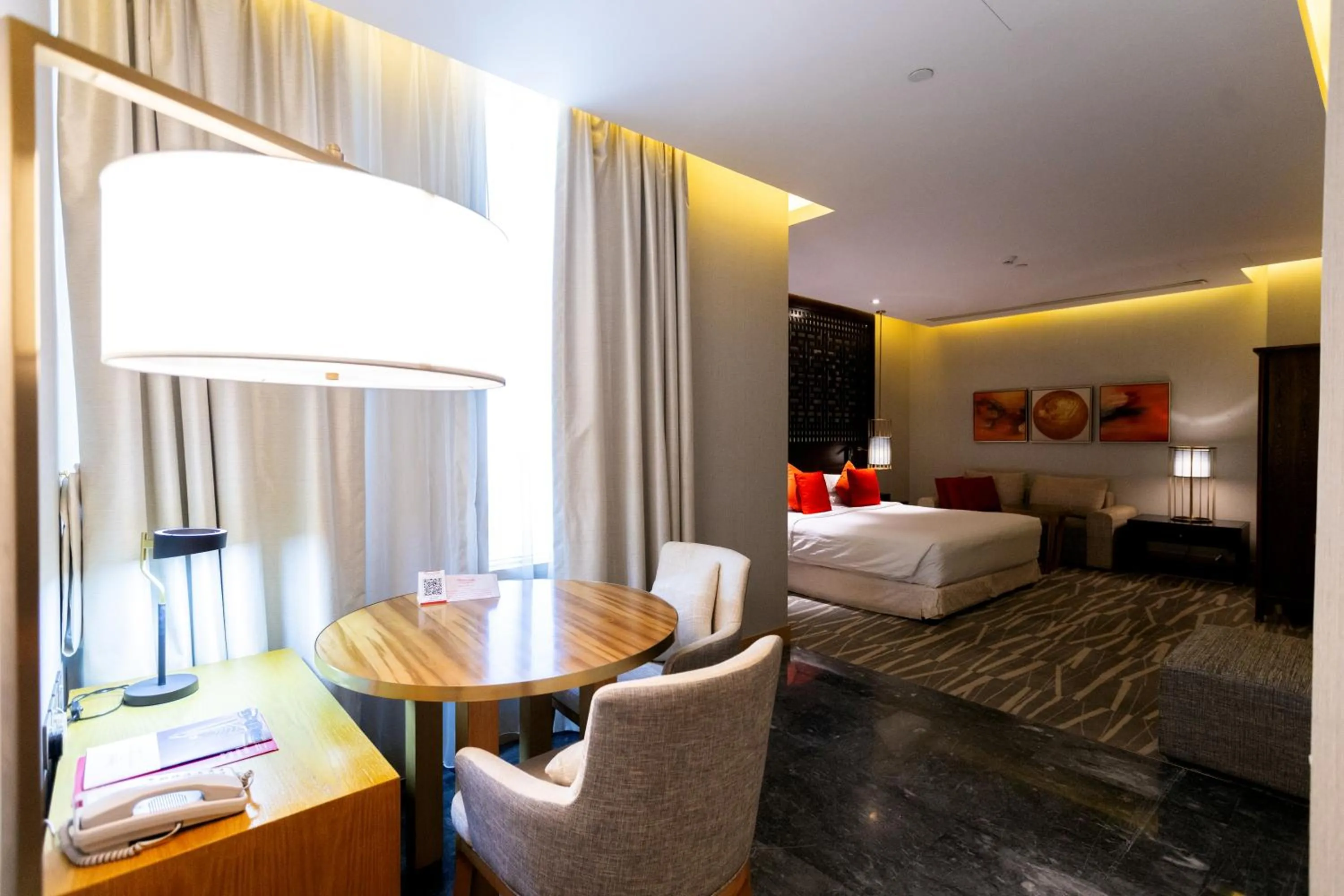 Bedroom, Bed in Ramada Hotel & Suites by Wyndham Al Qassim