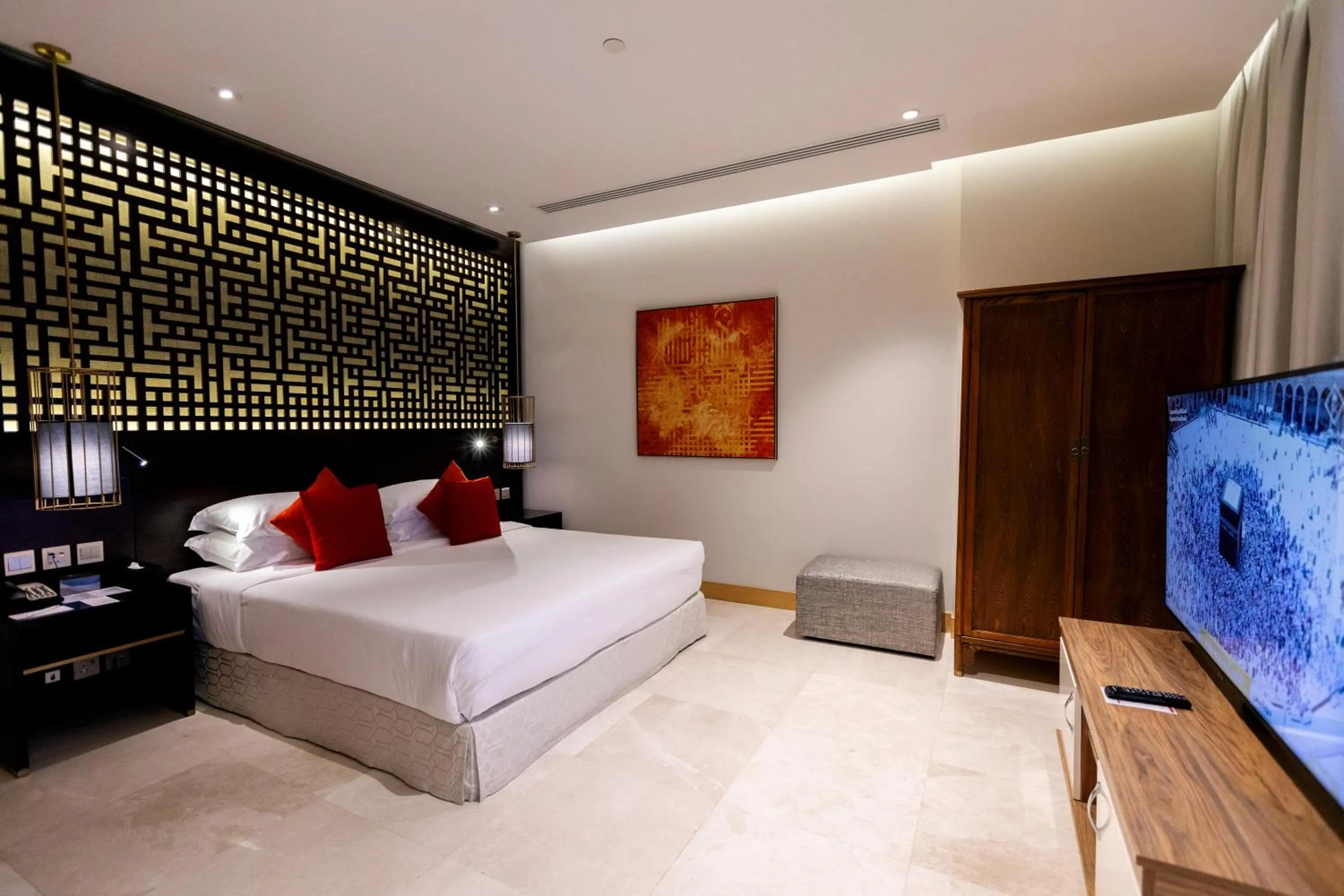 Bedroom, Bed in Ramada Hotel & Suites by Wyndham Al Qassim