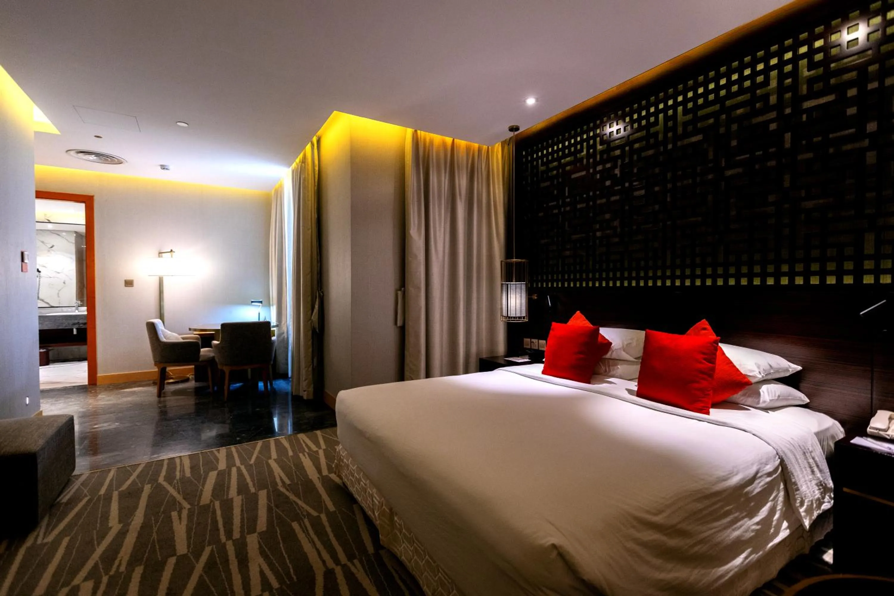 Bedroom, Bed in Ramada Hotel & Suites by Wyndham Al Qassim
