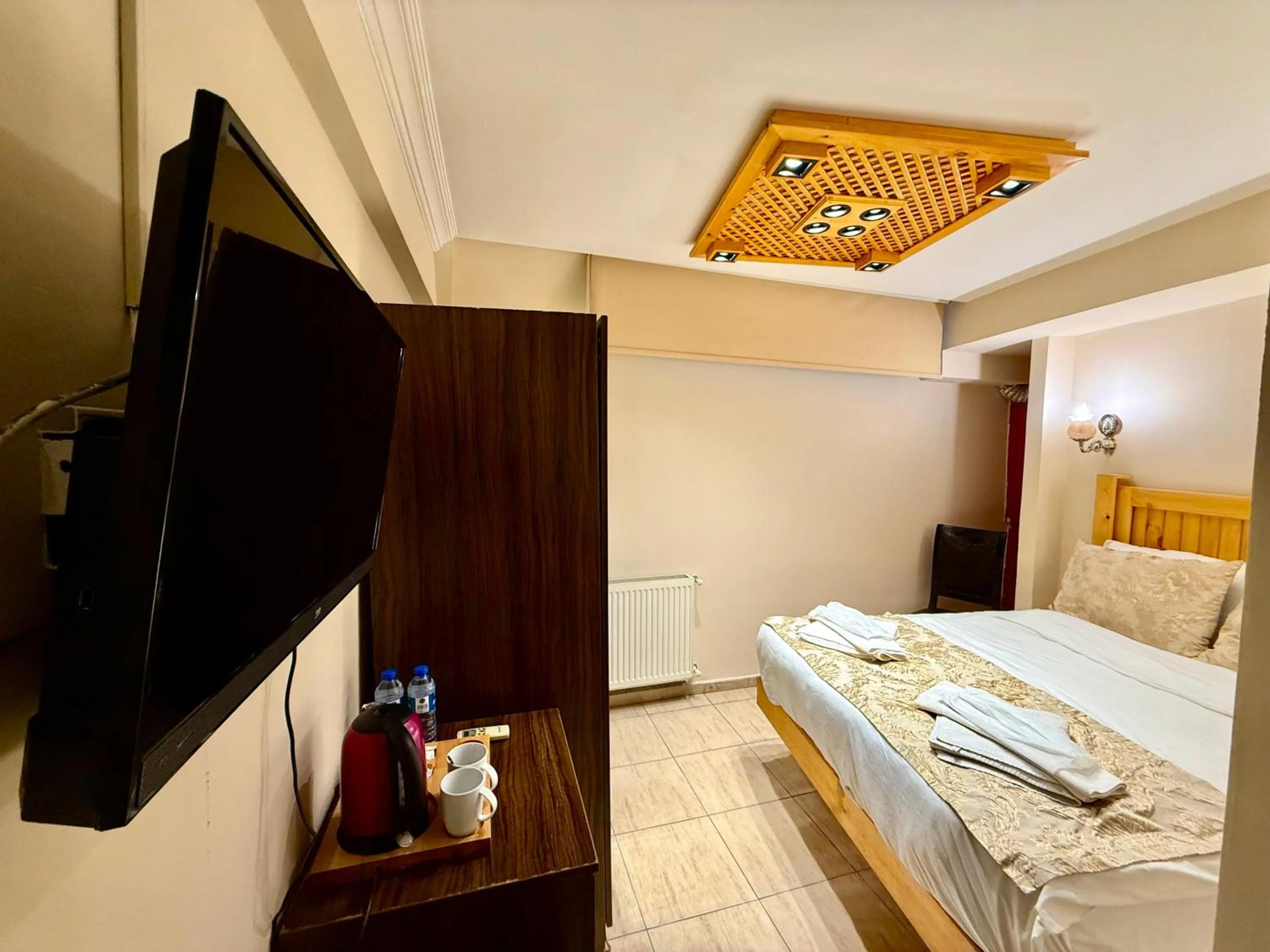 Bed in Magnificent Hotel