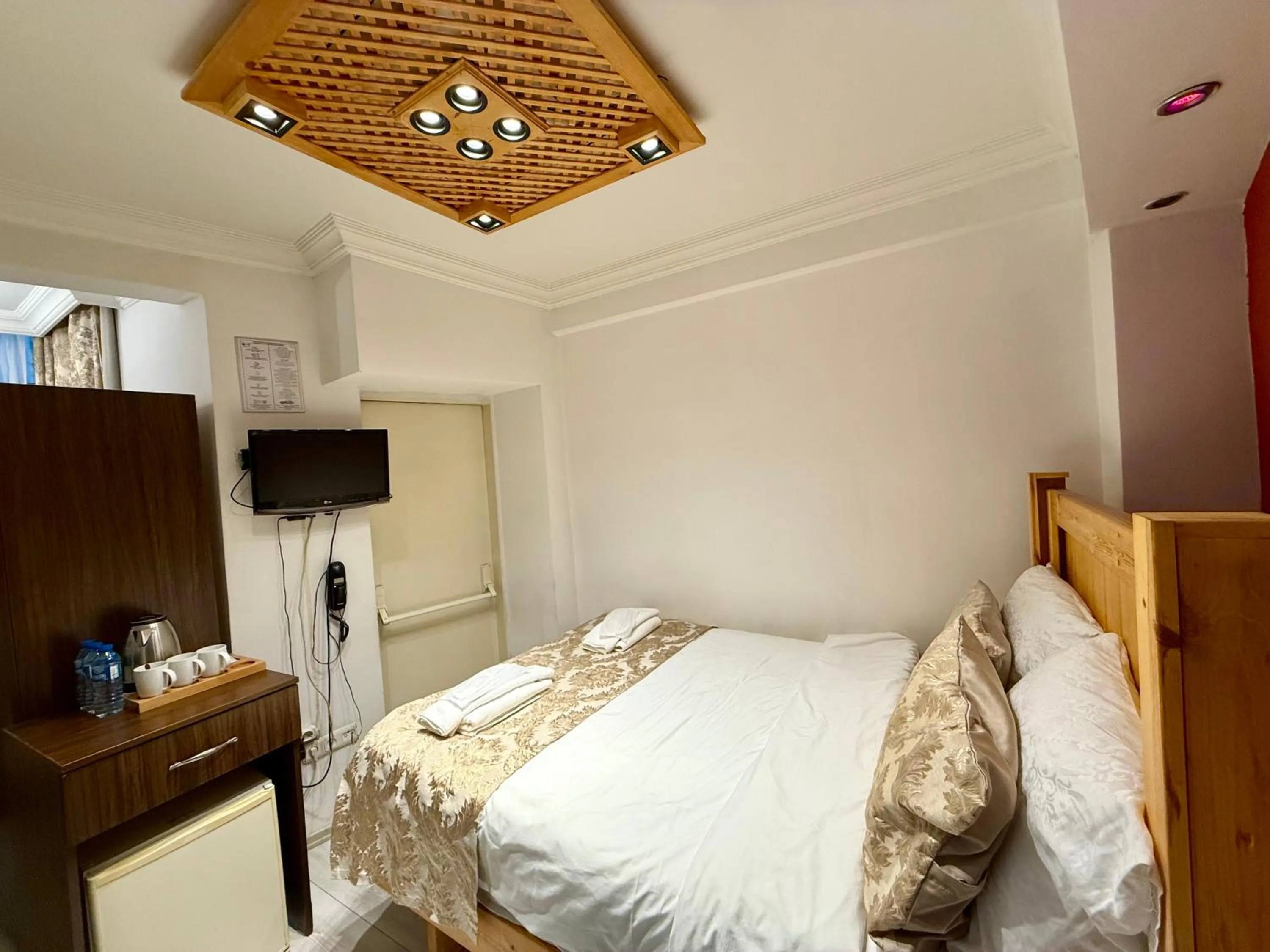 Bed in Magnificent Hotel