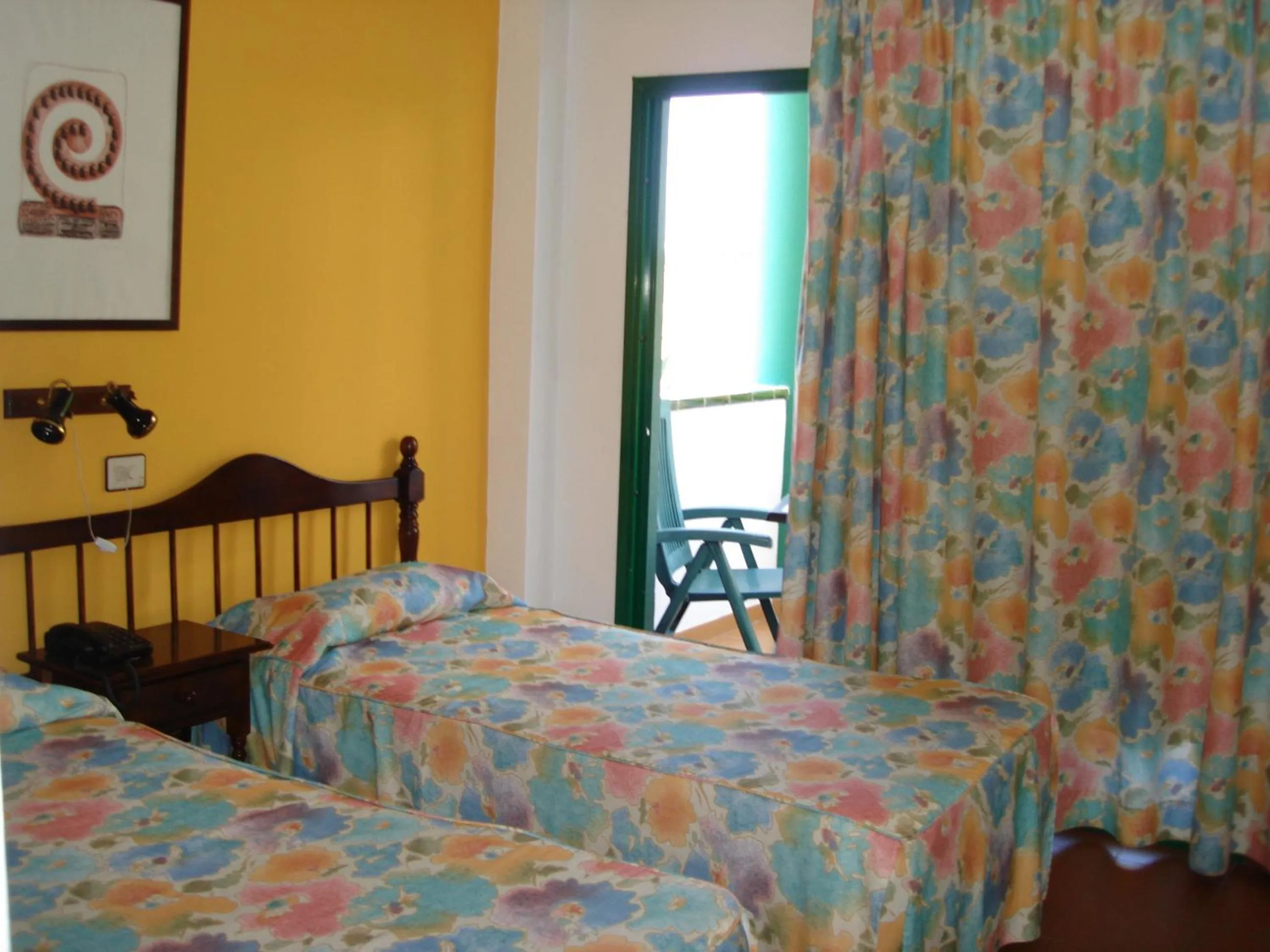 Balcony/Terrace, Bed in Hotel Ida Inés